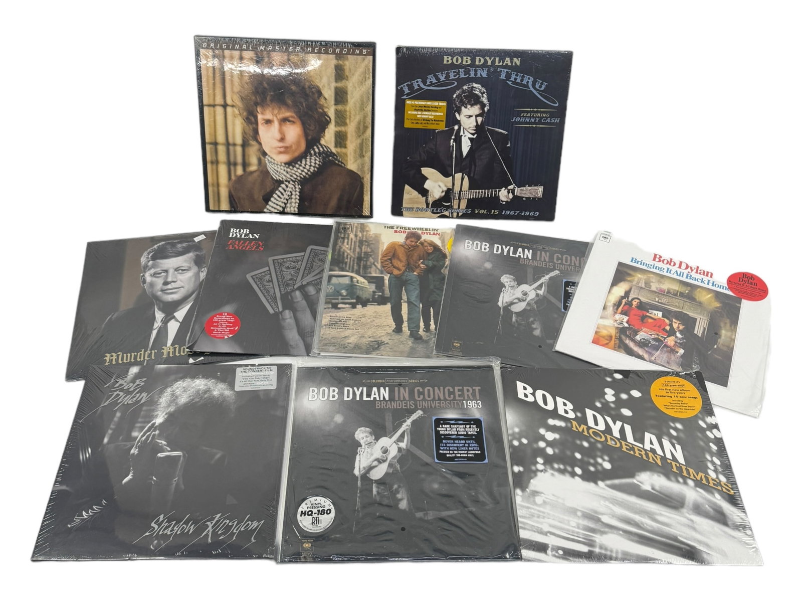 (10) Bob Dylan Vinyl Albums Sealed In Plastic: Dimensions: 79"x49" Condition: A few minor stains otherwise in good condition.