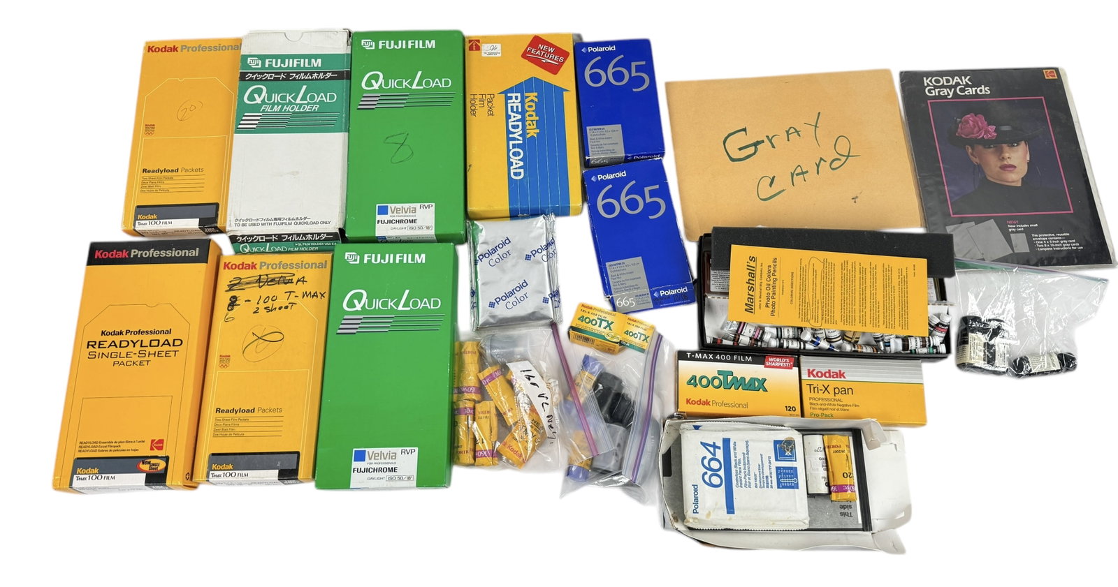 Group of Film Holders, Film, Photo Oil Colors: and More. Brands include Polaroid, Fujifilm, and Kodak. All boxes contain there items and some are brand new.