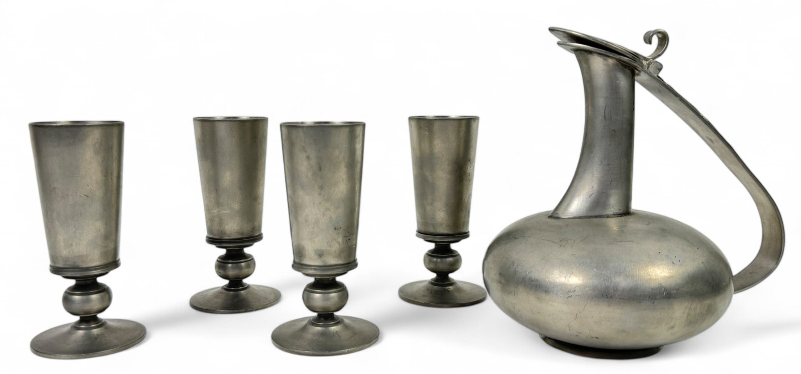 Gunnar Havstad Norway Deco Moderne Pewter: Vintage Norwegian designer Peter set Ewer & 4 wine or liquor cups all marked Havstad Norway pewter. This company started in 1928. Dimensions: ewer: 7", cups: 4" Condition: good, used condition with on