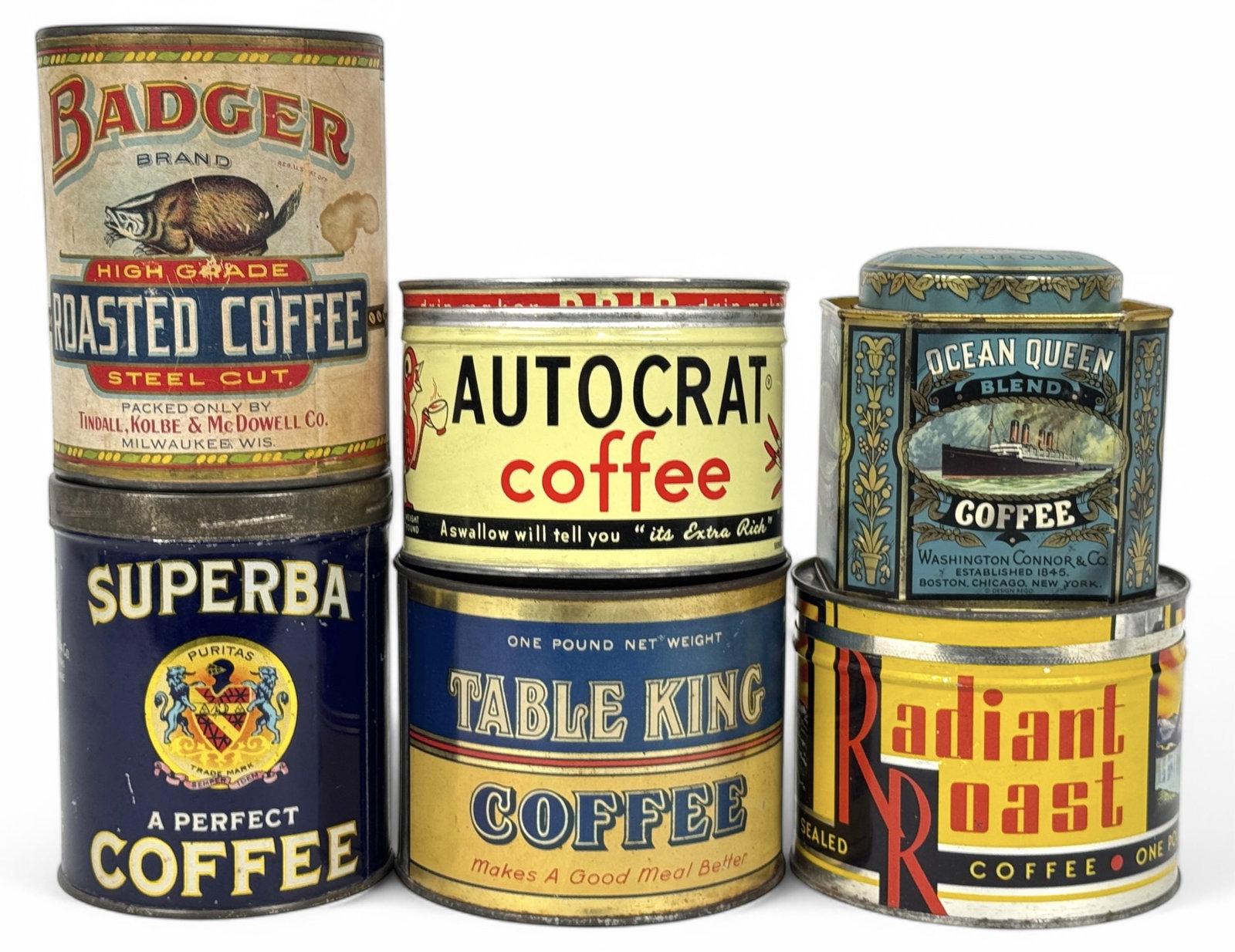 (6) Vintage Coffee Cans Including Superba: Badger, Autocrat, Ocean Queen, Superba, Radiant Roast, & Table King Tallest Can: 5 1/2" Condition: good vintage condition with original lids, all show signs of mild oxidation, tarnish, and we