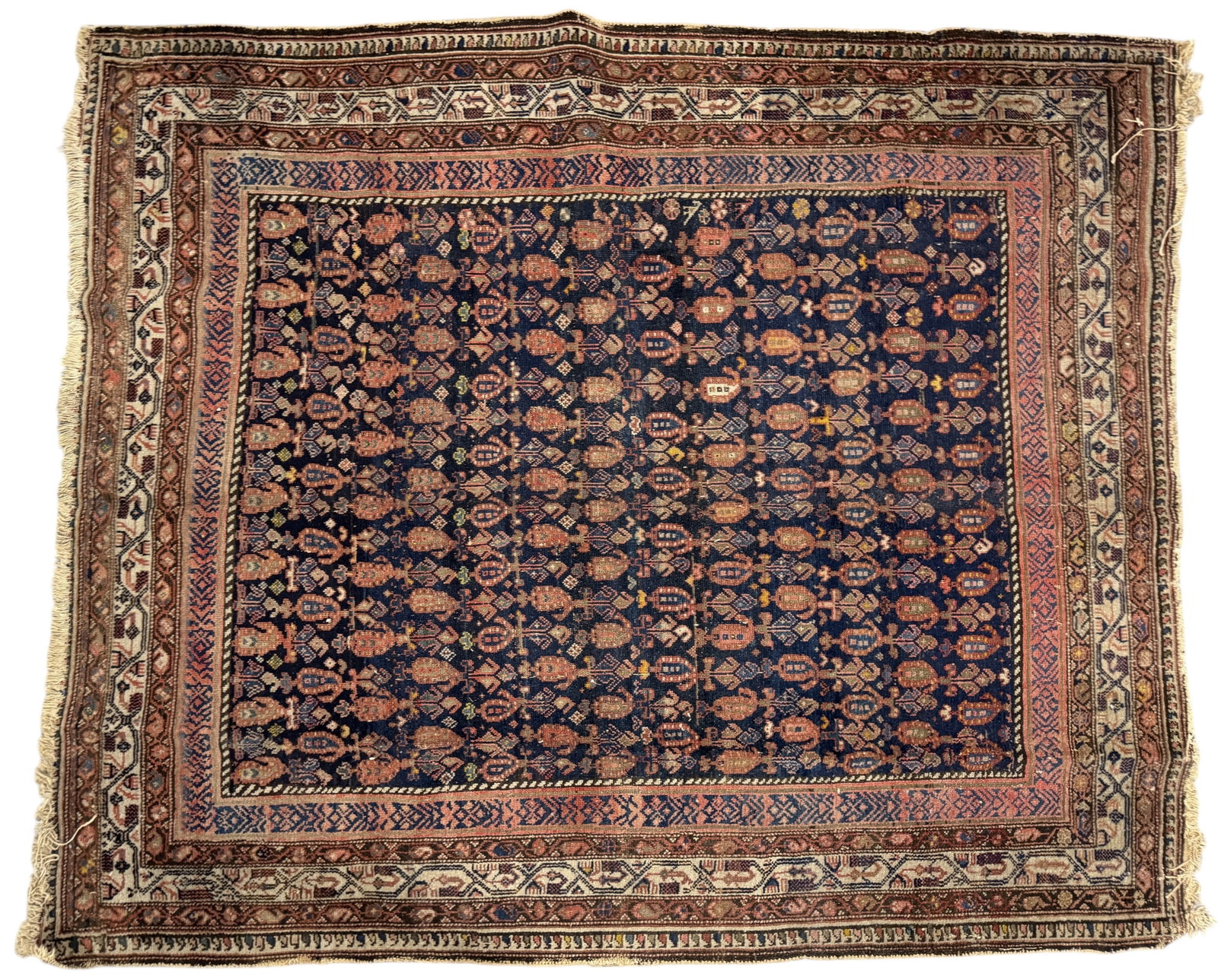 Antique Hand Knotted Persian Rug: Paisley and turtle shape motifs Size: 6' 1" x 5' 3" Condition: some fraying to edges and some missing warp threads in a few areas, otherwise in good vintage condition