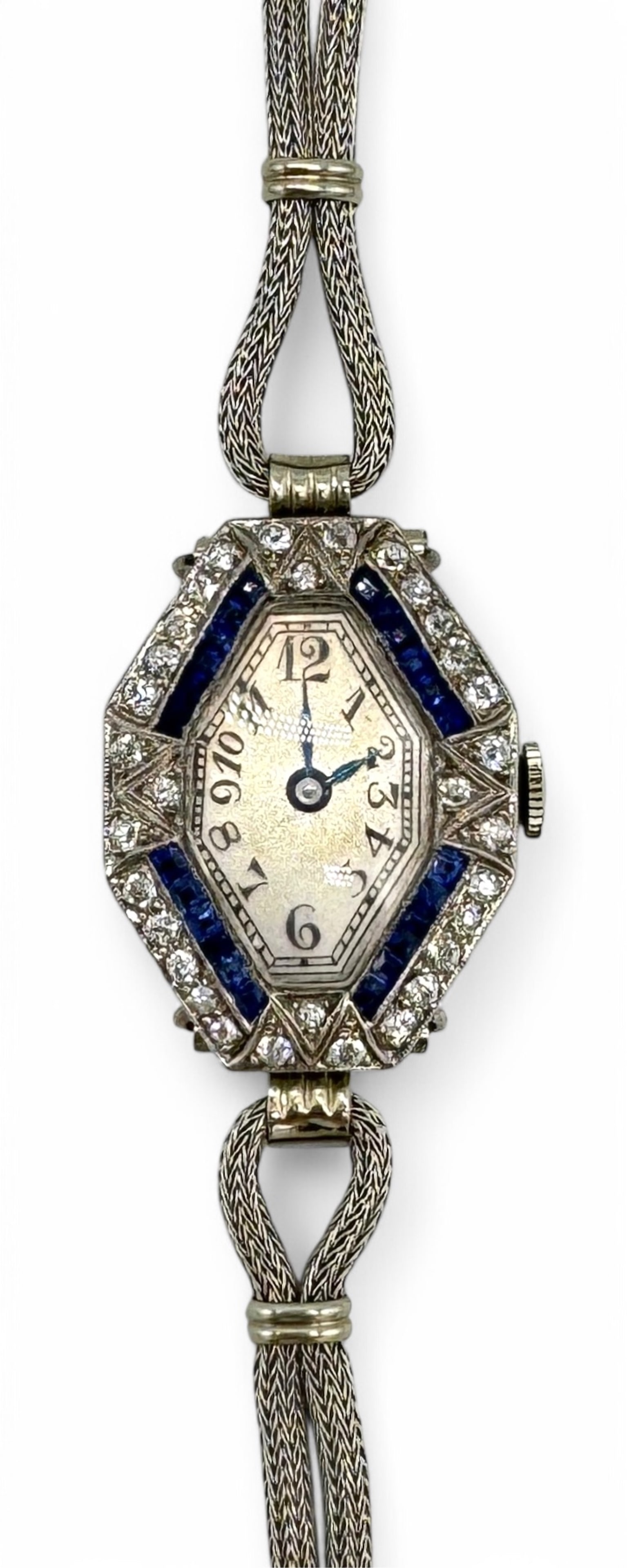 Ladies Deco Platinum, Diamond, & Sapphire Watch: With a 14K White Gold band, diamonds & sapphires are approximately 1.5mm Length: 6" Case Size: 28mm x 21mm Total weight: 19.4g Condition: good vintage condition, the watch is currently not wo