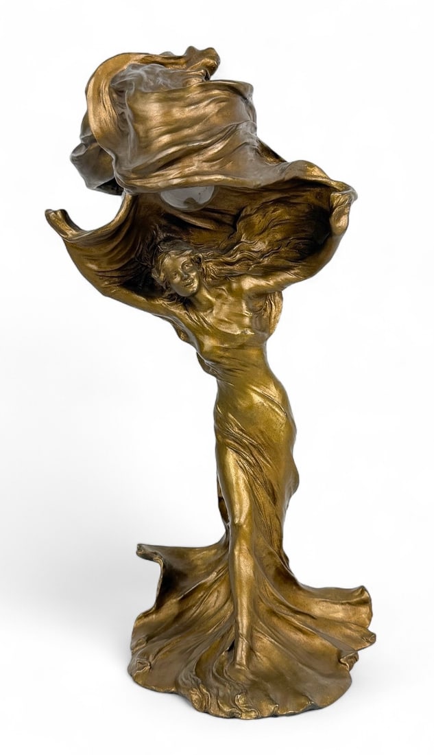 After Francois Raoul Larche Bronze Table Lamp: Foundry mark 1979 on base. Dimensions: 18"H x 8 1/2"W x 9 1/2"D Condition: Very good condition. The cord is present; the plug is missing and will need to be replaced for functionality.&