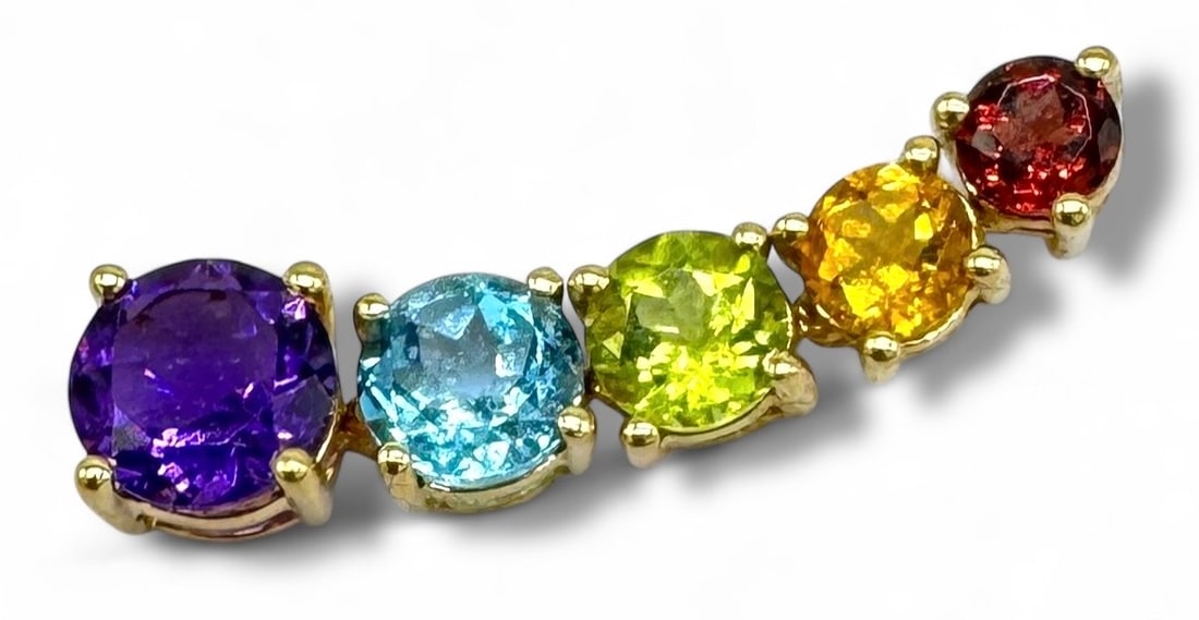 14K Garnet, Citrine, Peridot, Aquamarine & Amethyst Pendant: Five graduated stones arranged from smallest to largest. They range in size from 4mm to 7mm. Size:27.8mm long Weight: 2g Condition: Very good