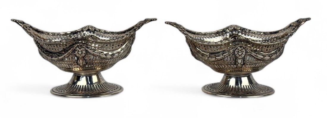 (2) Victorian Charles Stuart Harris Sterling Silver Bowls: Pair of reticulated English footed sterling silver candy dishes with maker's mark stamped on side of bowl. Total Weight: 8.3ozt Size: 2 3/4" T x 6 1/4" W Condition: Ver
