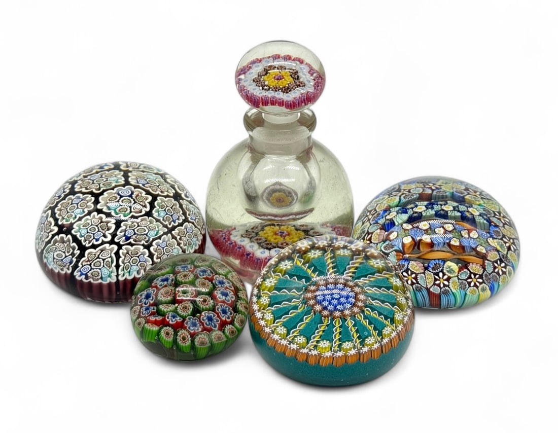 (5) Millefiori Art Glass Paperweights: Diameter 2" - 3" Condition: All pieces are in good condition. The stopper has a small nick on the inside.