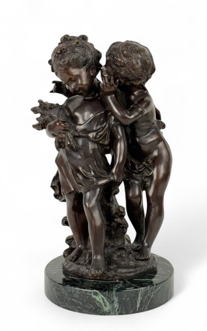 After Auguste Moreau "Whispering Children" Bronze: Auguste Moreau (French, 1834–1917), bronze sculpture with an incised signature on the base of the bronze. Mounted on a green marble base. Height: 17" Condition: Very good.