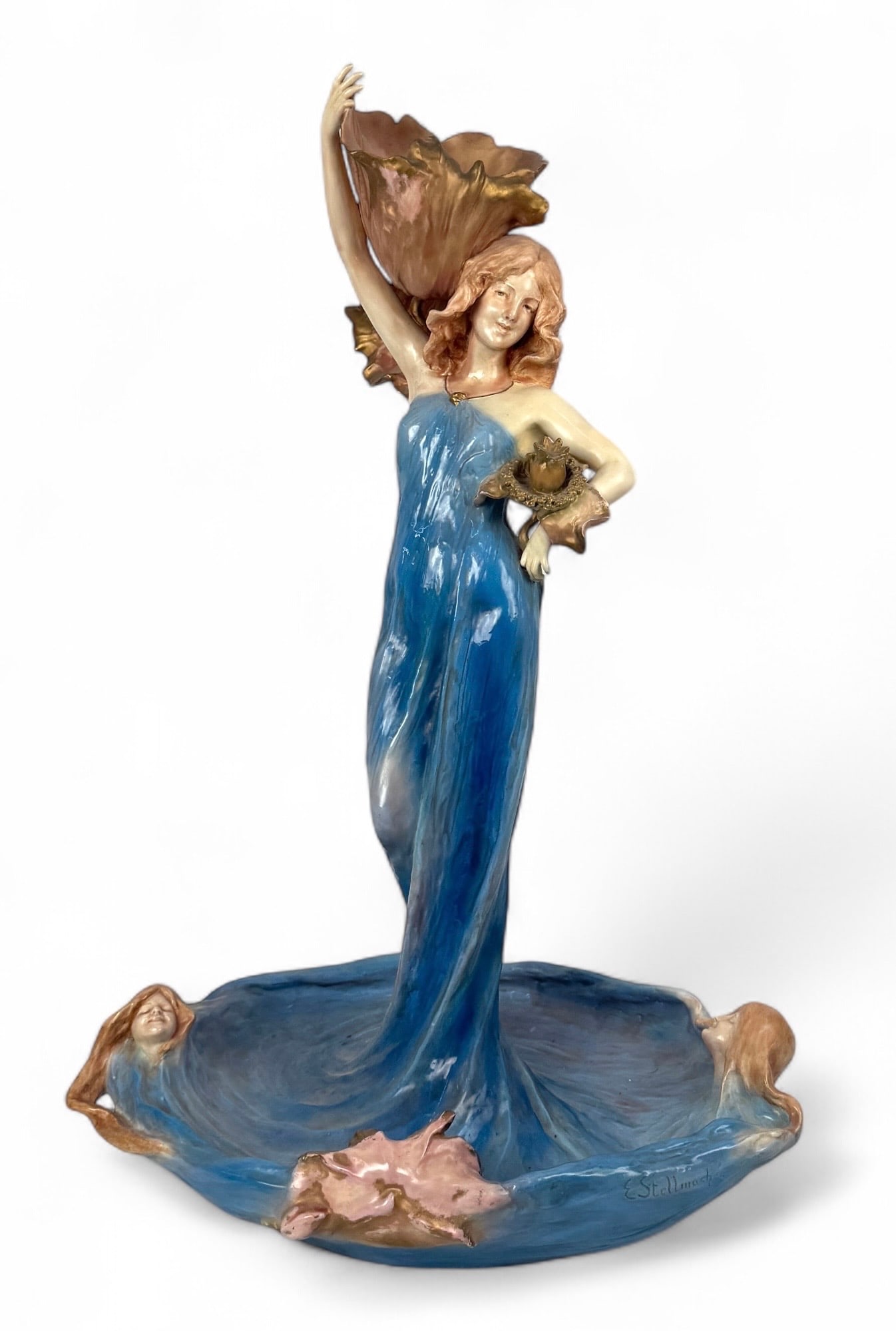 Monumental Eduard Stellmacher Amphora Centerpiece: Signed on the base with the RSTK Teplitz Amphora mark. Tall figural polychrome pottery centerpiece with ornate detailing.