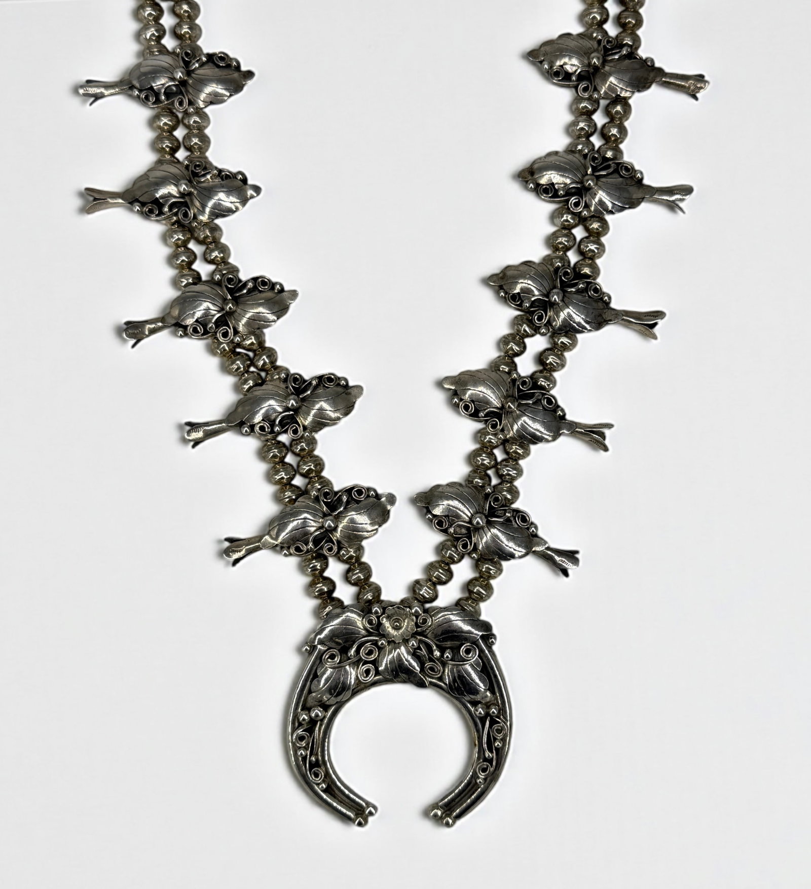 V. Chee Navajo Sterling Silver Squash Blossom Necklace: Length: 24" Weight: 153g Condition: Light tarnish and minor surface wear; overall good condition.