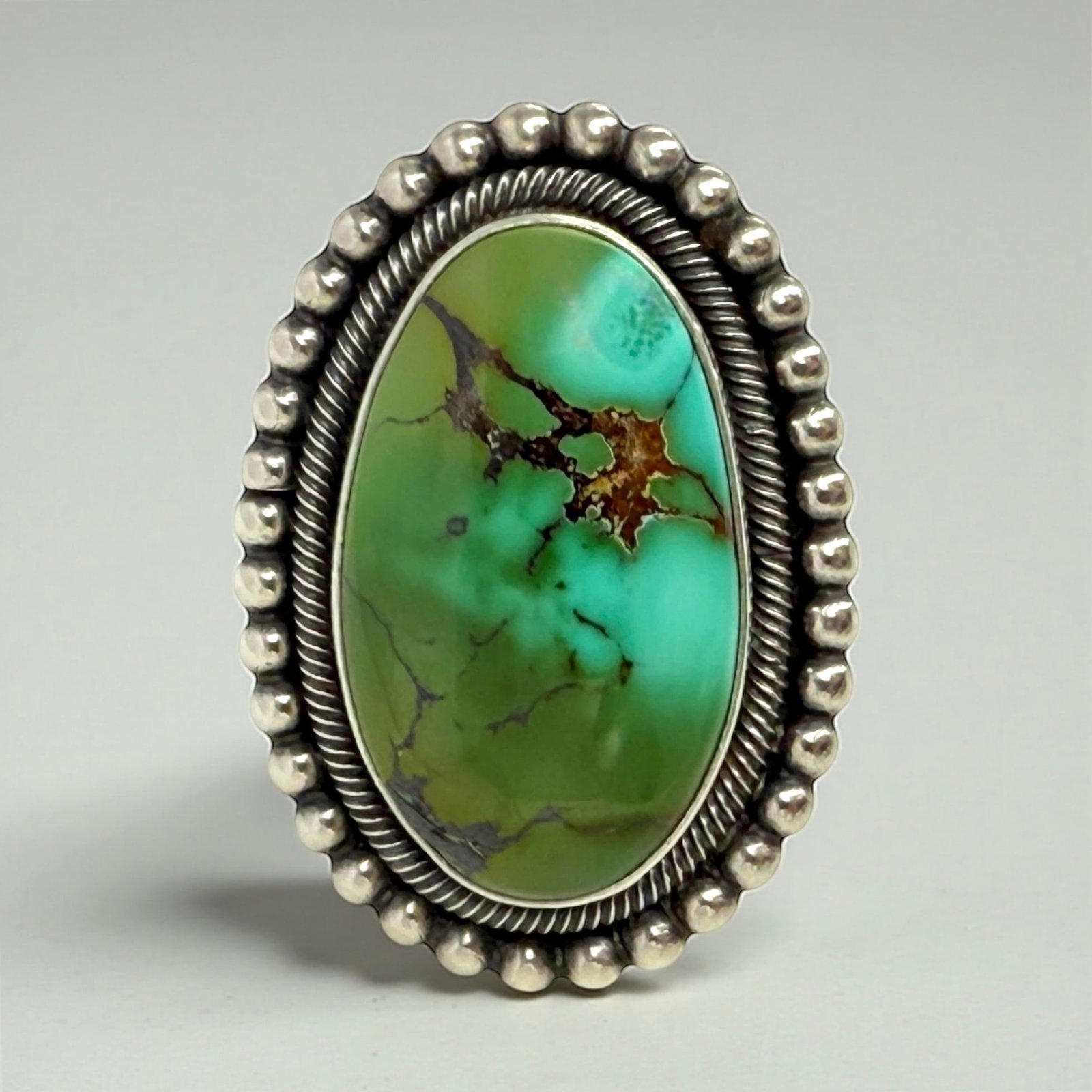 Ernest Roy Begay Sterling & Turquoise Ring: Size: 8.5 Weight: 22.8g Stone: 31mm x 18.6mm Condition: Very good.