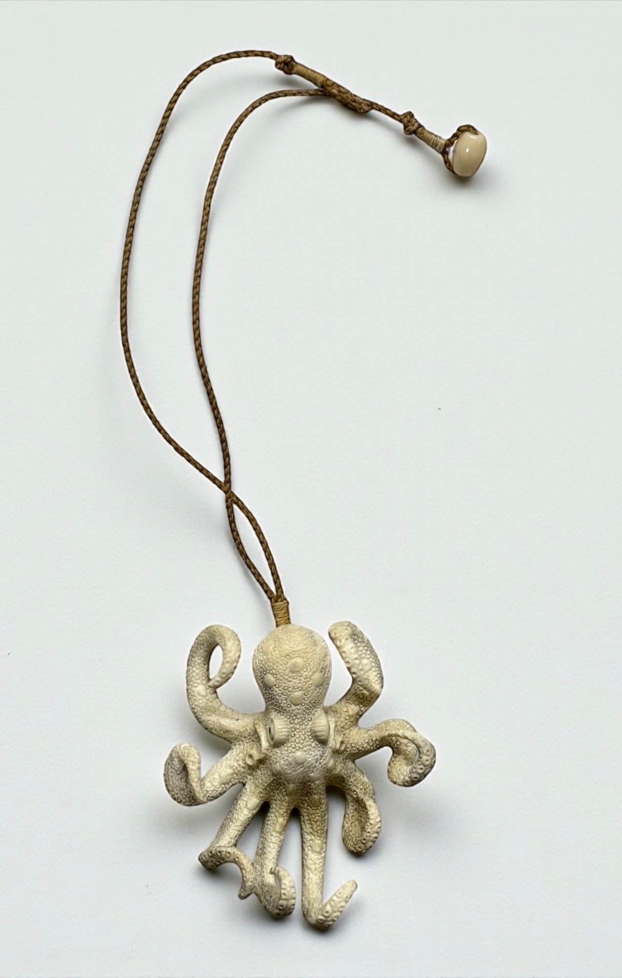Carved Moose Antler Octopus Pendant (1 of 6)