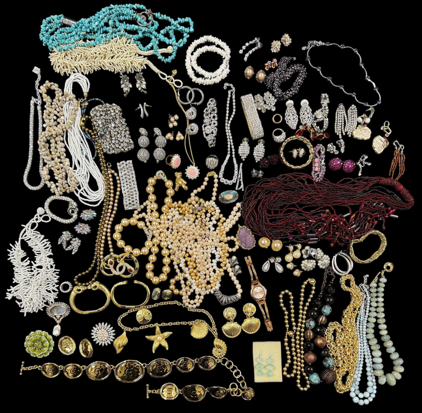 Group Of Costume Jewelry Including Rhinestones & Beaded Necklaces: A wide variety of necklaces, bracelets, and earrings. Please see photos for details. Condition: Good