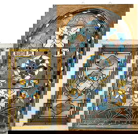 (2pc) Stained Glass Window Panels (Large): Smaller Panel: 40 3/8"T x 25"W x 1 3/8"D Larger Panel: 57 3/4"T x 36"W x 2 1/8"D Condition: Surface wear and minor scratches to the wood frame. Areas of finish los