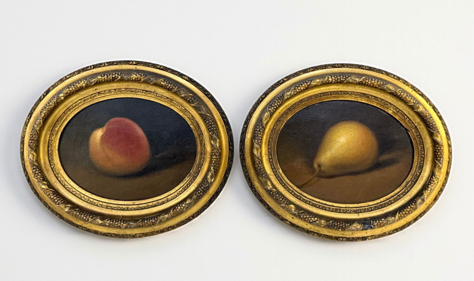 Pair of Antique Fruit Still Life Paintings in Oval Gilt Frames (1 of 12)