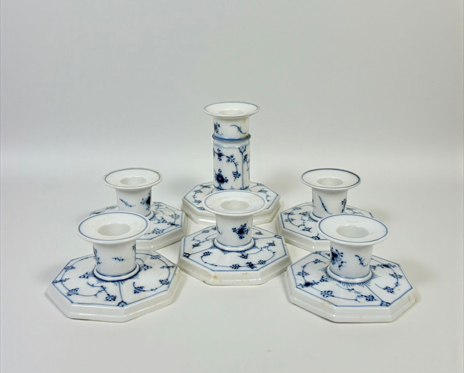 (6pc) Royal Copenhagen Blue Fluted Candlesticks: Tallest Piece: 4" Condition: Light candle wax residue; otherwise, in overall very good condition with no chips or cracks.