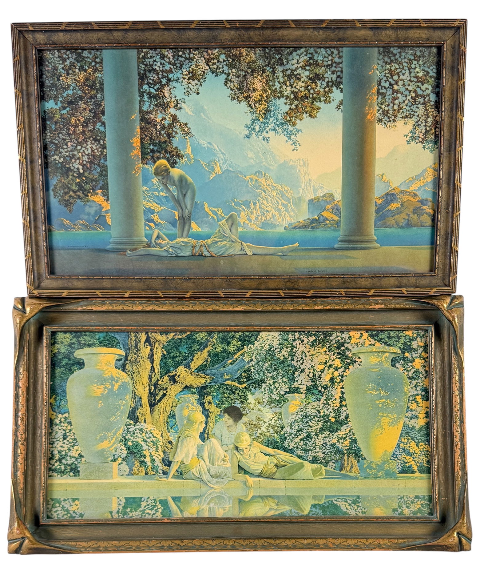 Pair Of Maxfield Parrish Framed Prints: Largest Frame: 12" x 21" Condition: Both frames have areas of paint loss and small nicks. Both images are in good condition.