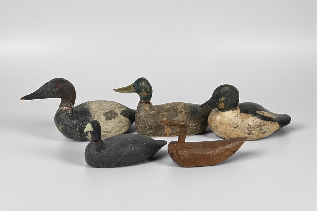 Collection Of Vintage Hand-Carved Wooden Duck Decoys: Largest measures 16 3/4" L Condition: Surface wear throughout with paint loss, scuffs, and age-related cracking. See photos for details. 