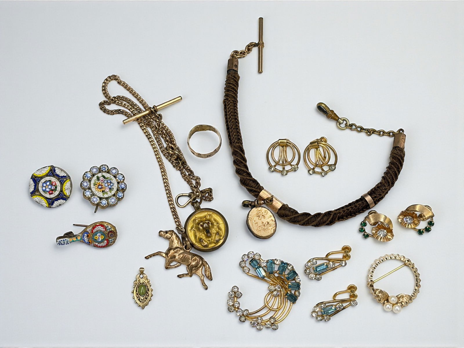 Group of Vintage Jewelry: Dimensions of Longest Piece: 17" L Condition: The pieces are in overall good vintage condition, with varying levels of tarnish to the metal. The mosaic pins are in good condition, with a f