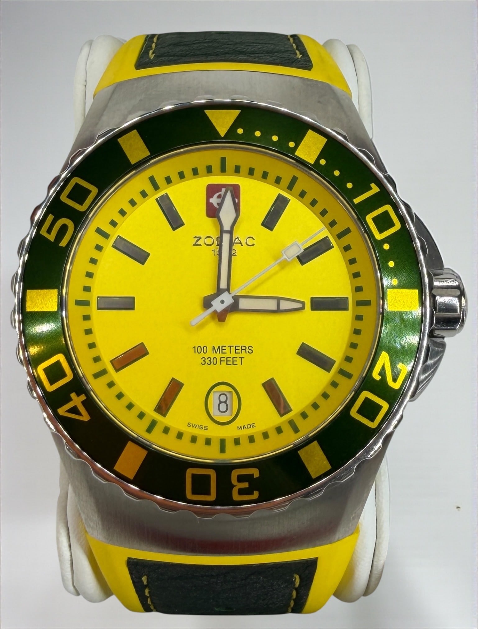Zodiac Sea Ghost Yellow Dial Z02411 Men's Wrist Watch: 100 Meters Quartz Movement With Yellow & Green Leather BandCase: 43mmBezel: Unidirectional rotating Condition: Like New in box with papers including warranty card. No
