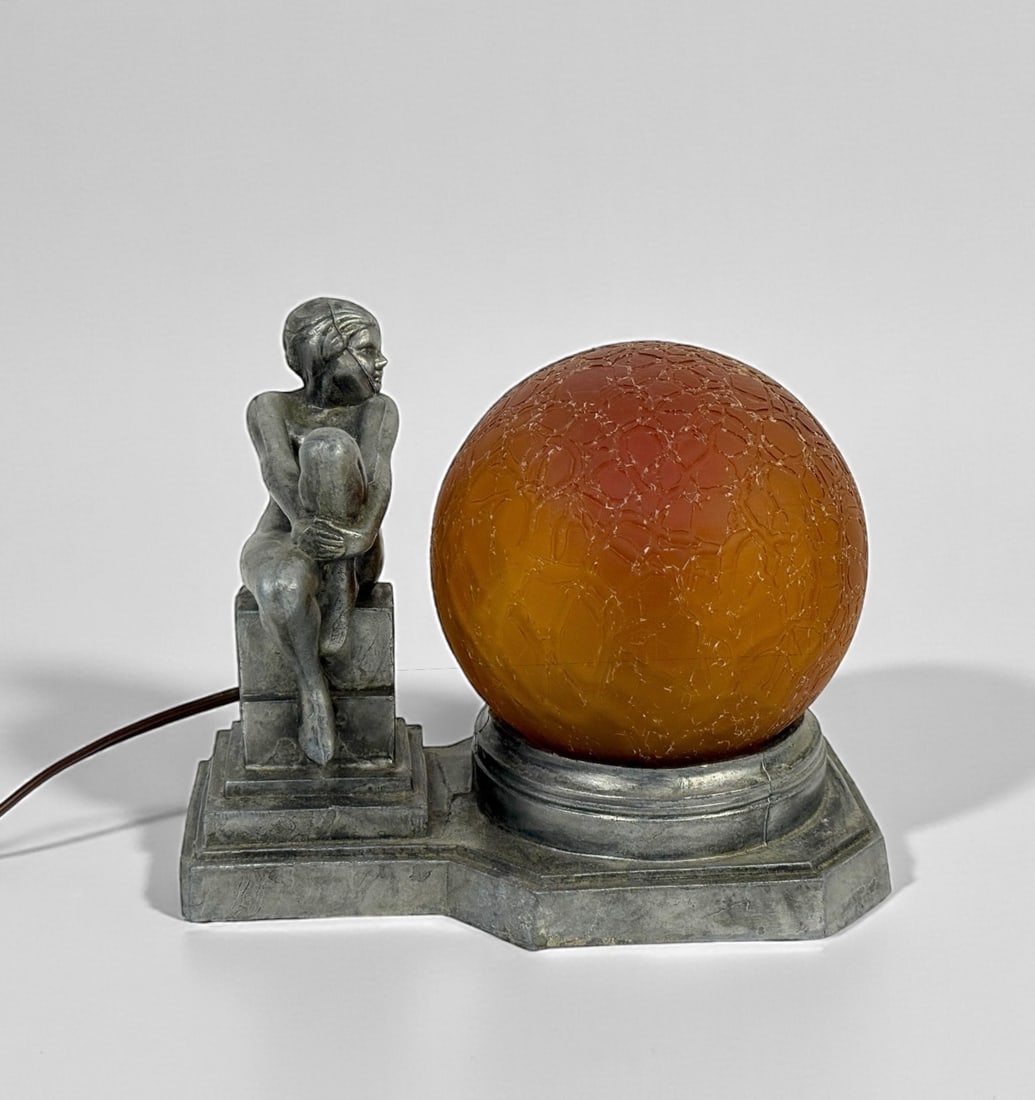 Art Deco Silver Table Lamp With Amber Shade: Dimensions: 6 1/2" T x 8" L x 5" D Condition: The lamp is in good vintage condition with surface wear consistent with age. Lights up when plugged in. Wiring appears ori