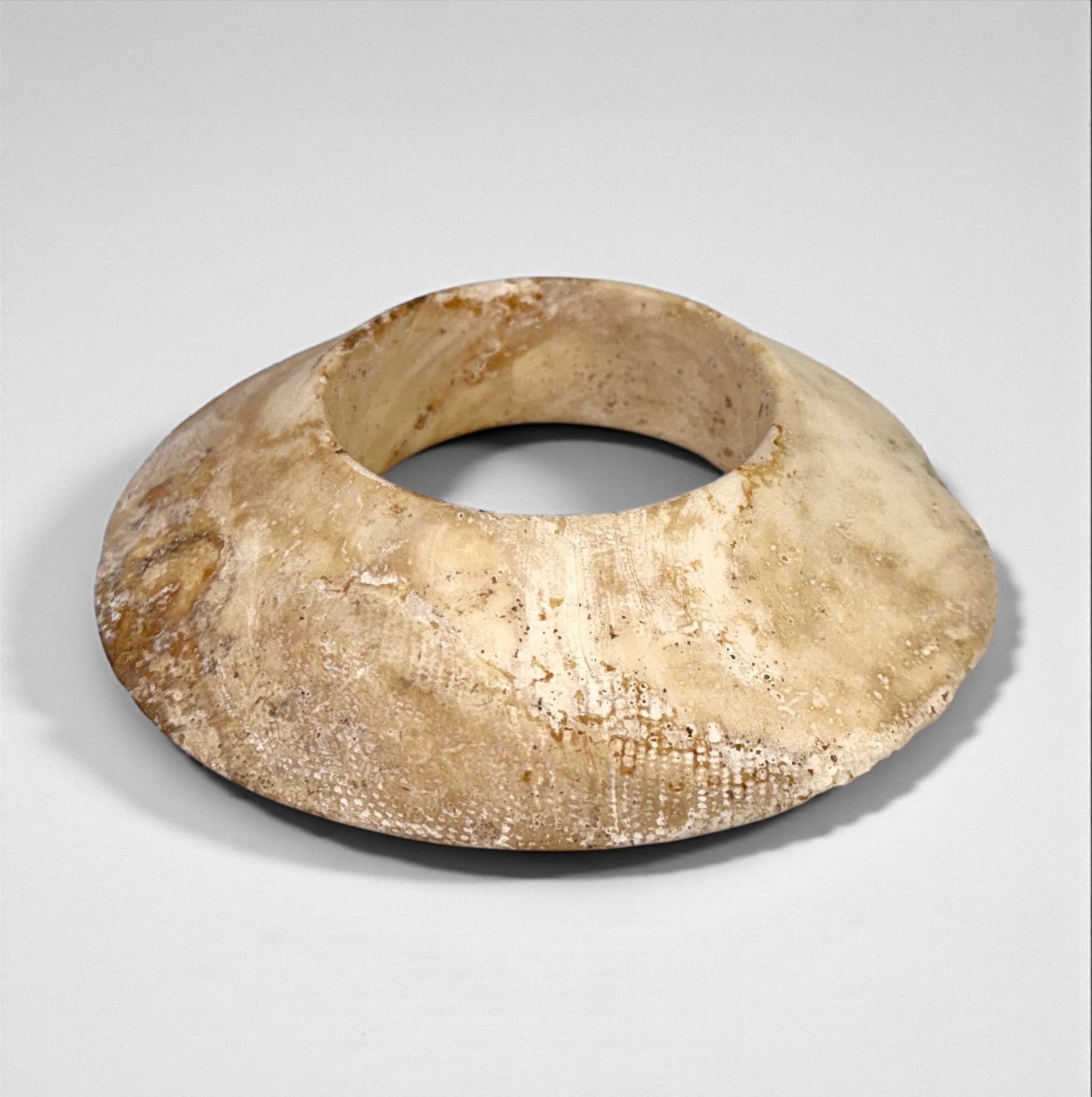 Archaic Chinese Carved Arm Piece: Dimensions: 1" T x 5" W Condition: The piece is in good condition with discoloration to the material due to natural aging. There are nicks and marks of the material throughout the arm