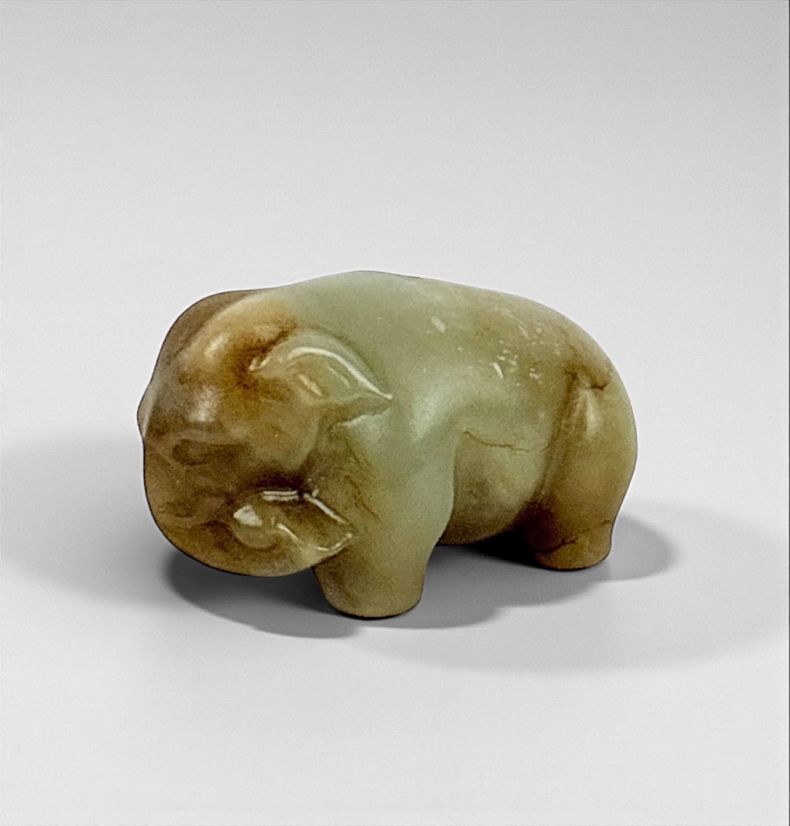 Vintage Chinese Jade Elephant: Dimensions: 1" T x 1 3/4" W x 1" DWeight: 49g Condition: The pendant is in very good condition, with some minor loss to carving details consistent with age and handling. 