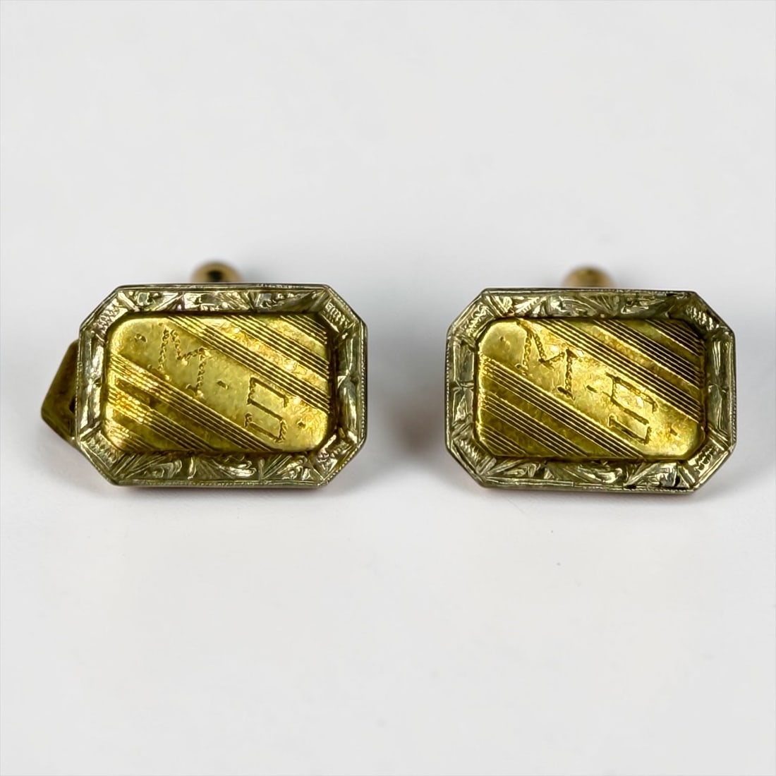 Pair of 14K Gold Cuff Links: Dimensions: 1/2" x 1/4" Weight: 6.55g Condition: Good. Monogrammed. 