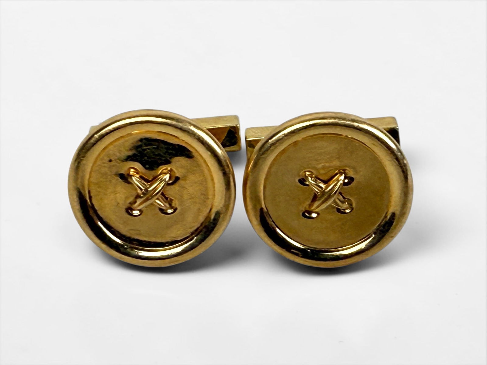 Pair Of Tiffany & Co 14K Yellow Gold Button Cufflinks: In Tiffany BoxDiameter of each button: 19mmTotal Weight: 15g Condition: Good