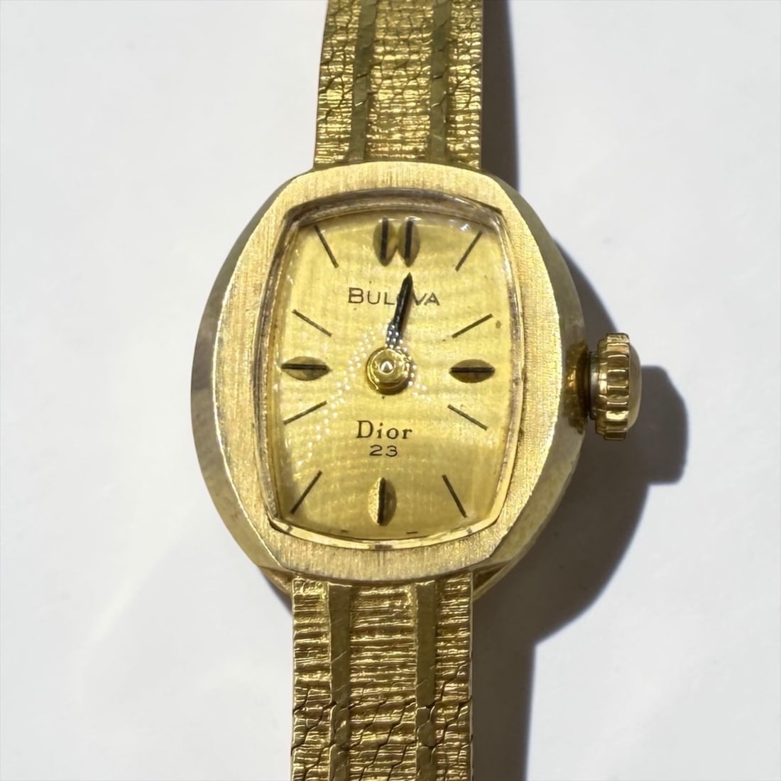 Vintage Bulova Christian Dior 14k Gold Ladies Wristwatch: Face: 15.2mm x 13.6mmBand: 6" Long Weight: 14.8g Condition: Minor surface scratches, otherwise the watch is in good condition. Not tested for timekeeping. 