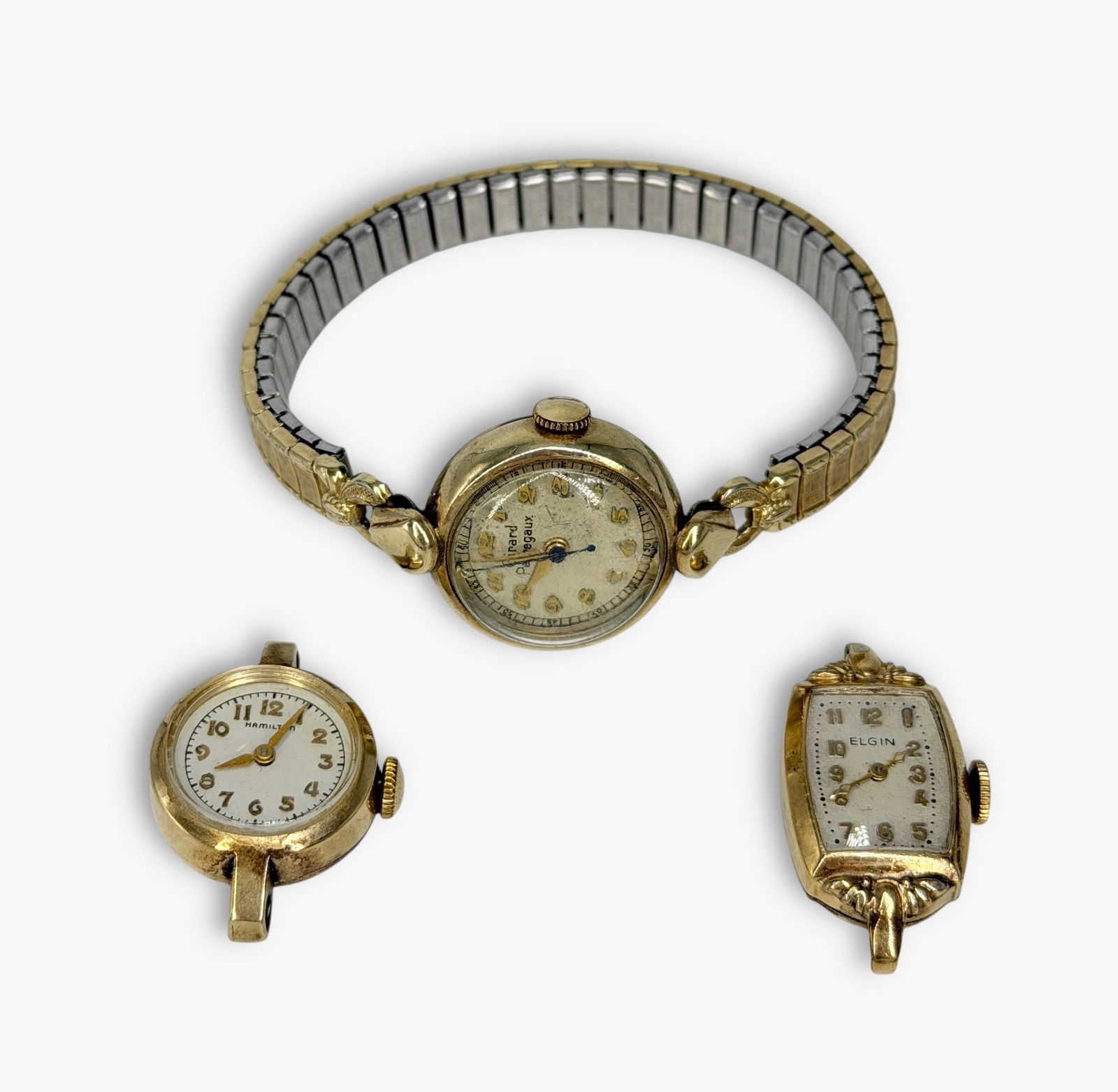 (3) 10K G.F. Ladies Watches: Dimensions: 22mm watch face with a 5.75" band that stretches. Total Weight: 33.6g Condition: Wear to the watch face, consistent with age. The additional two watches without