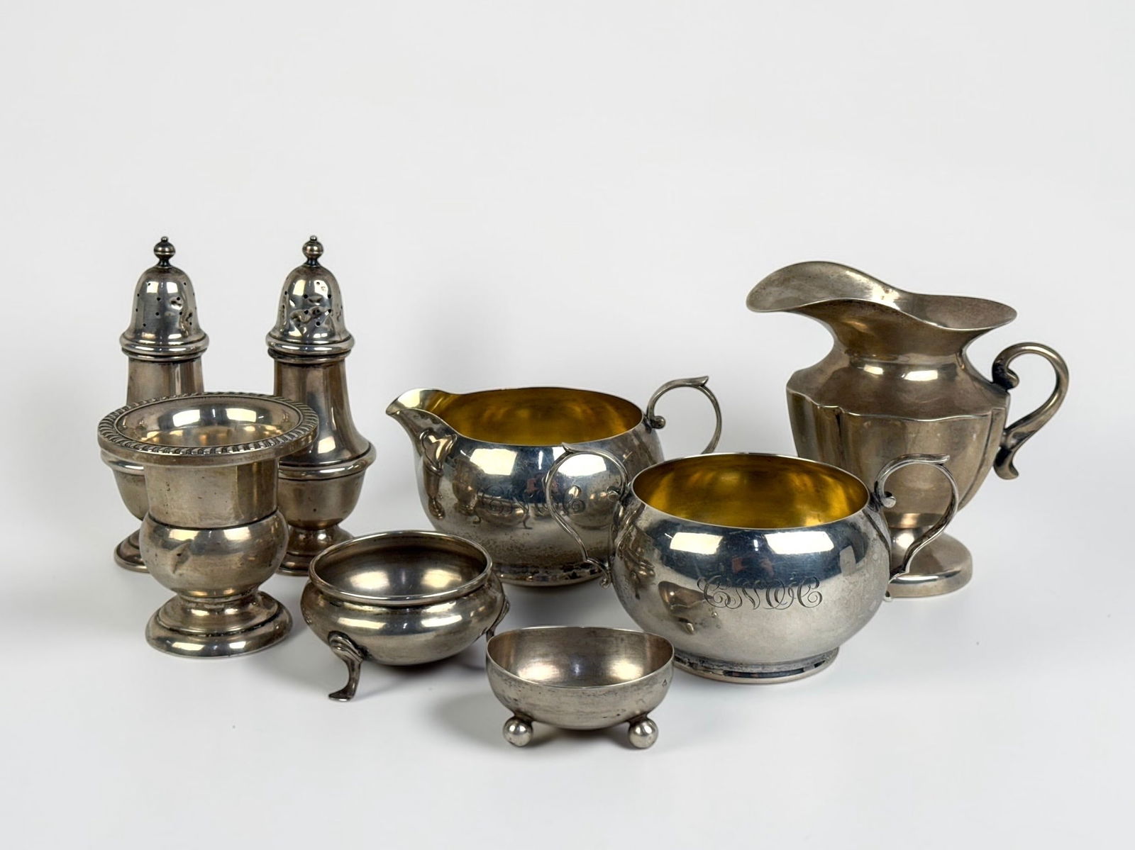 Group Of Sterling Silver Serving Pieces: Dimension: Tallest pieces approx. 4" Total Weight: 18.27ozt Condition: Various levels of tarnishing, with marks and scratches to the surface. See images for details. 