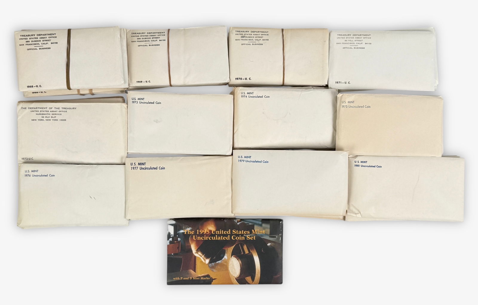 (65) US Mint Uncirculated Sets in Envelopes (1960s-1995): Grouping includes (8) 1968s and (5) 1969s. Each envelope contains (2) sleeves. Condition: See images for details
