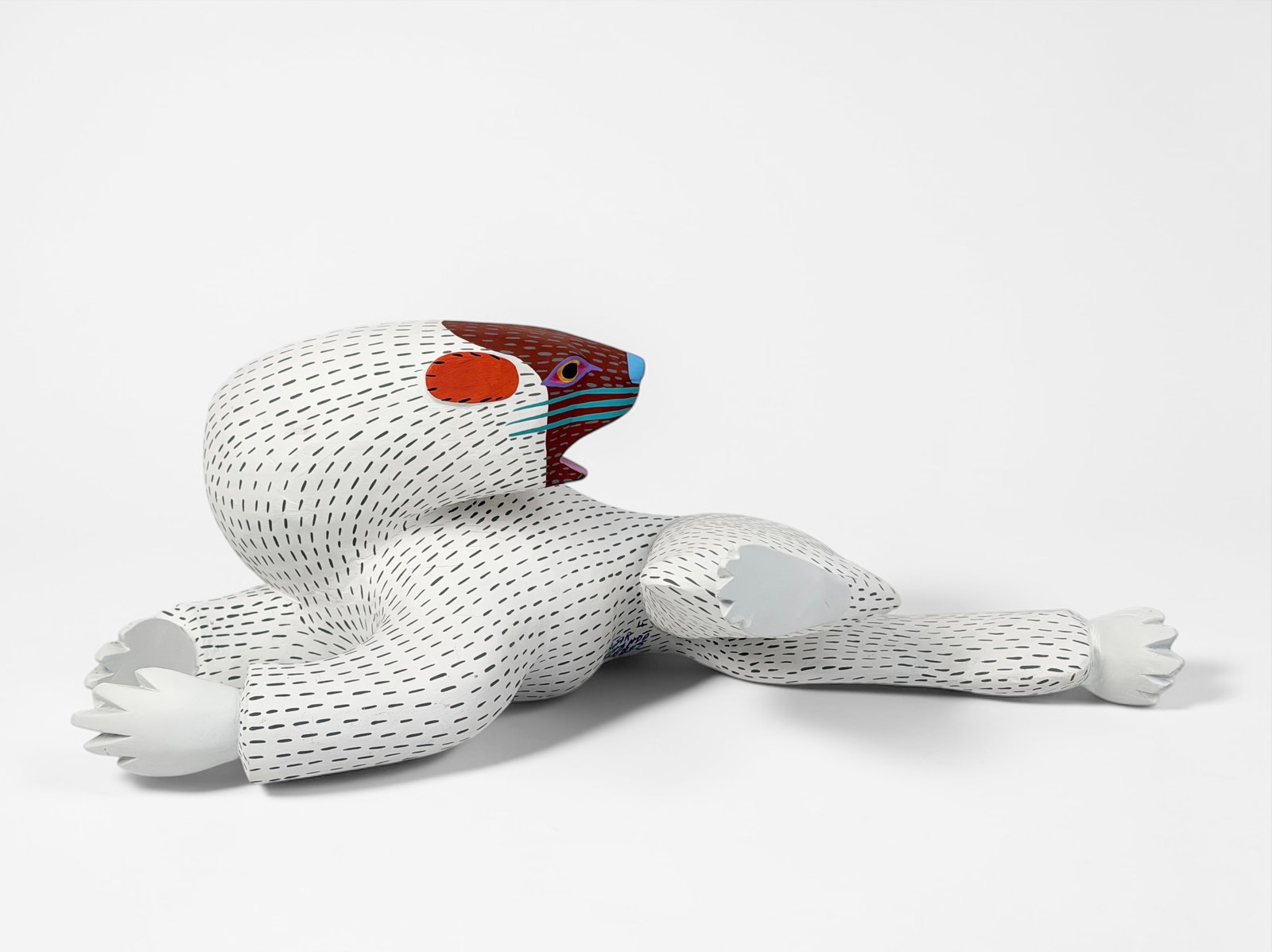 Armando Jimenez 'Polar Bear Alebrijes' Wood Carving: Signed by the artist. Dimensions: 7 1/2" x 18 1/2" x 12" Condition: Minor cracks and marks to the wood and paint; otherwise, in good condition. 