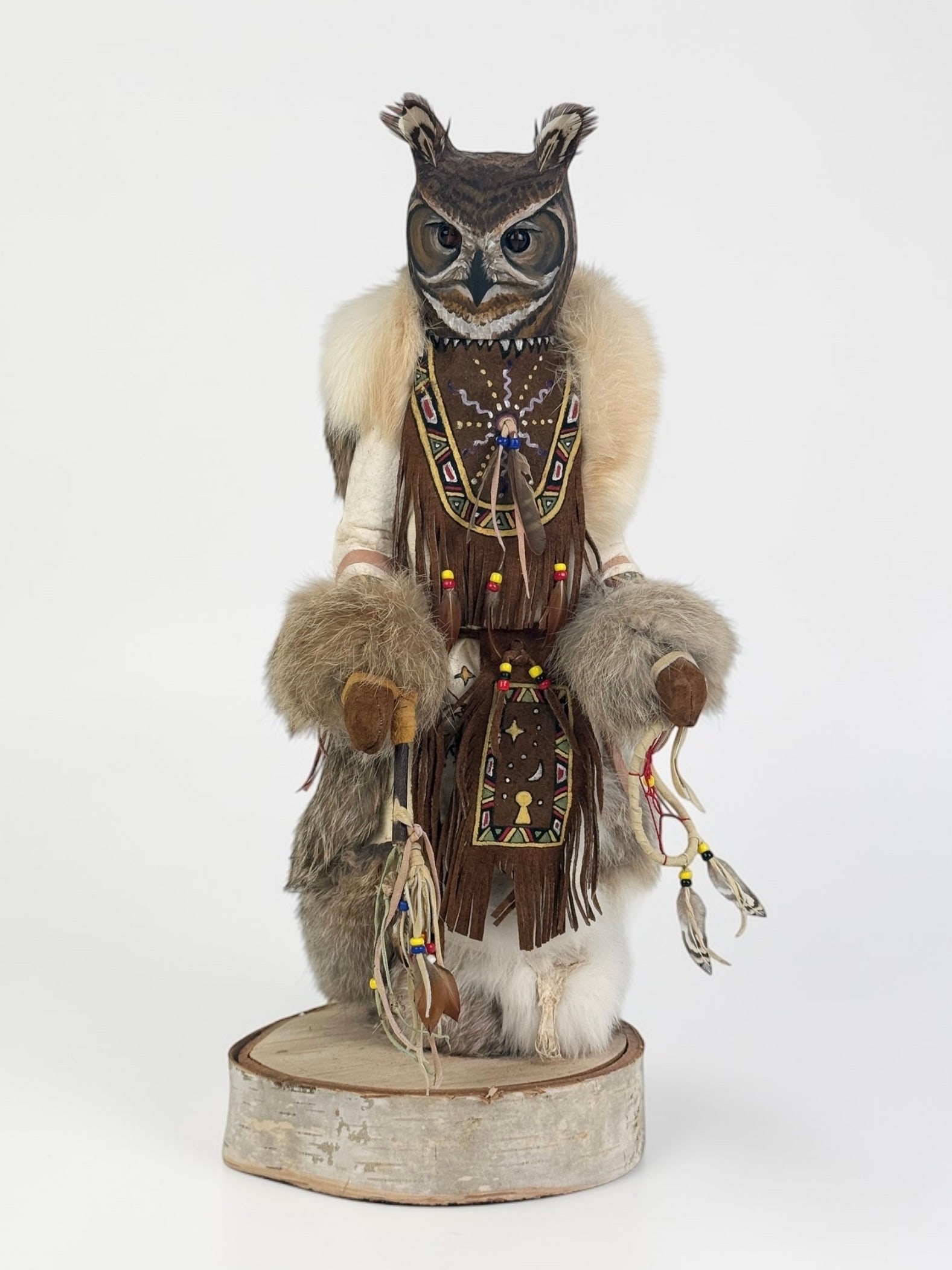 Kevin & Shawn Gadomski Ojibwe Kachina Doll: Tag from Freedom Enterprises. Dimensions: 14 1/2" x 6" Condition: Minor wear to the leather; otherwise, in good condition. 