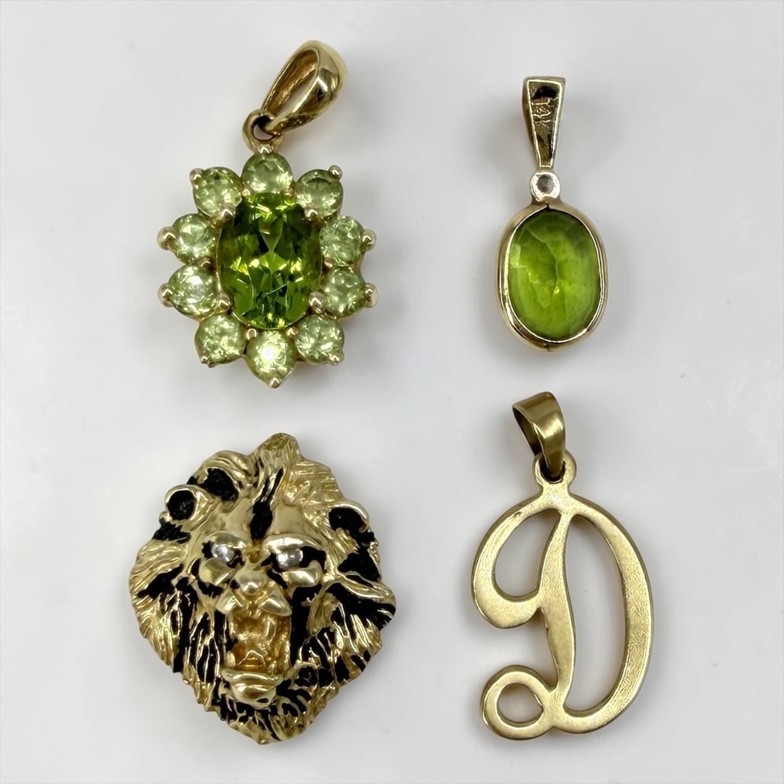 (4) 14K Gold Pendants: Total Weight: 6.3g Dimensions: 17.5mm x 15.5mm largest pendant Condition: Pendants are in good condition. See images for details. 