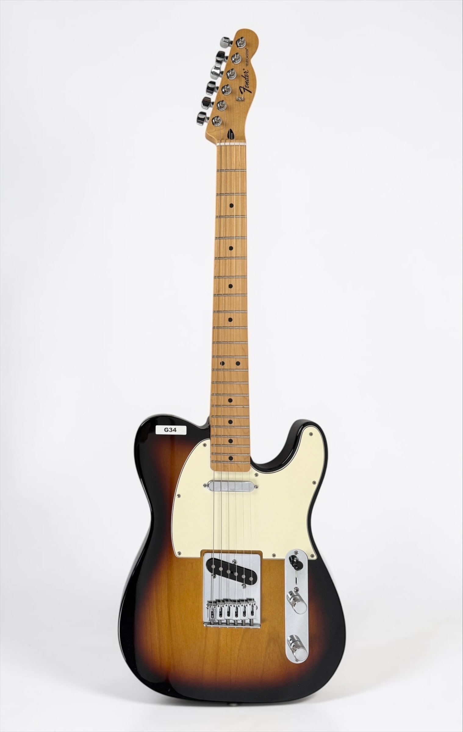 2013 Fender Telecaster Electric Guitar: Color: Sunburst Serial Number: MX12303723 Dimensions: 38" Long Condition: In good condition. 