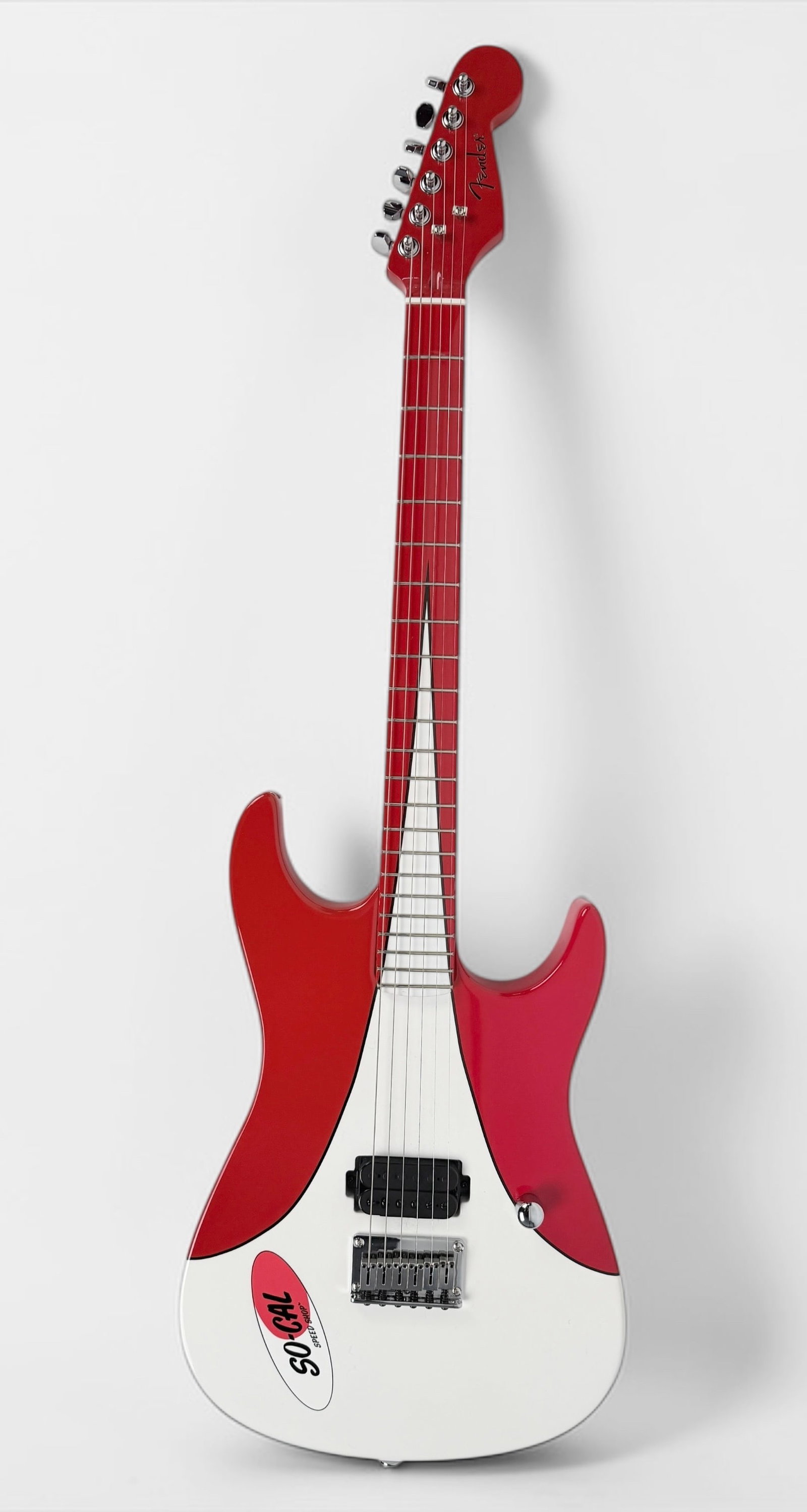 2005 Fender So Cal Stratocaster Guitar: Color: Red/White Serial Number: 04114082 Case: SKB Hard Case Note: One of about 600 made in Korea. "Very Cool" So Cal Speed Shop opened in 1954. Dimensions: 39" Long 