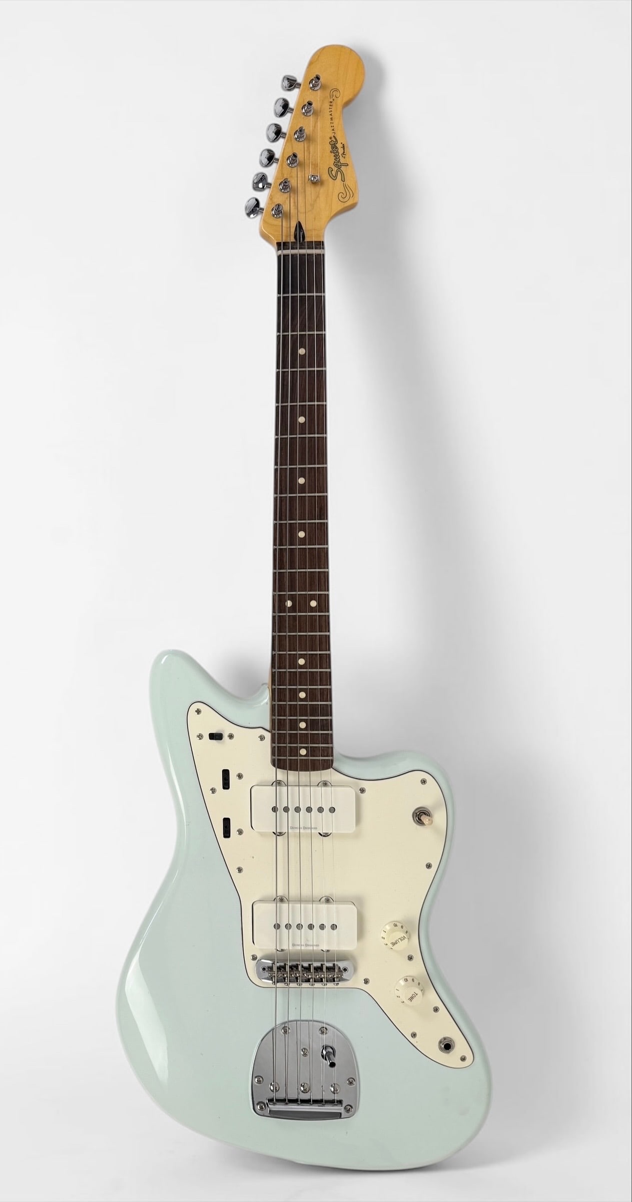 2013 Squier Vintage Modified Jazzmaster Electric Guitar: Color: Sonic Blue Serial Number: ICS13025591 Dimensions: 41" Long Condition: The guitar is in good condition. Light surface marks to the body. 