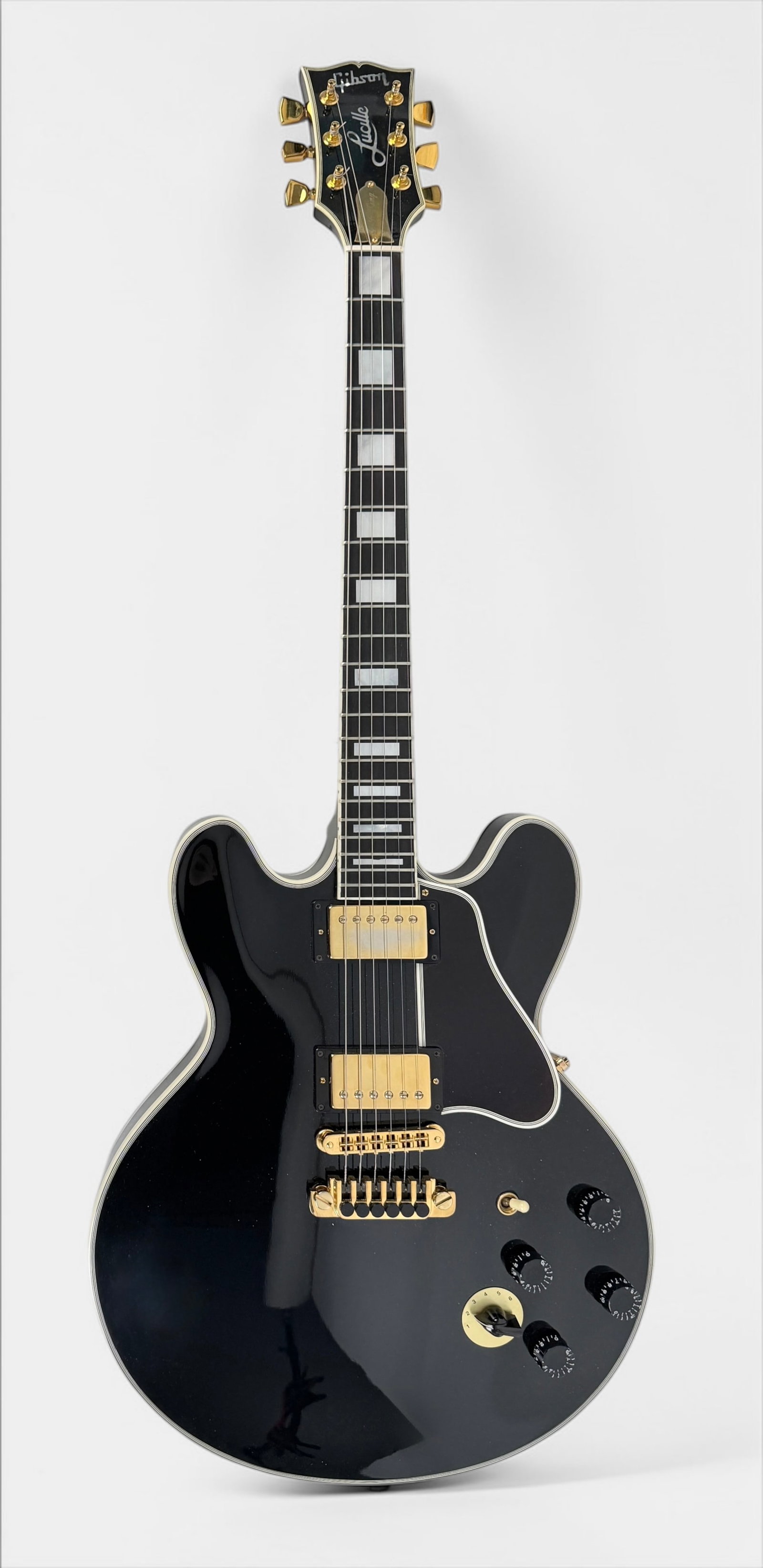 1993 Gibson BB King Lucille Signature Electric Guitar: Color: Black Hardware: Gold colored hardware Serial Number: 90343713 Case: Gibson Hard Case Dimensions: Guitar: 42" x 16" x 2" Case: 45" x 18" x 5" &n