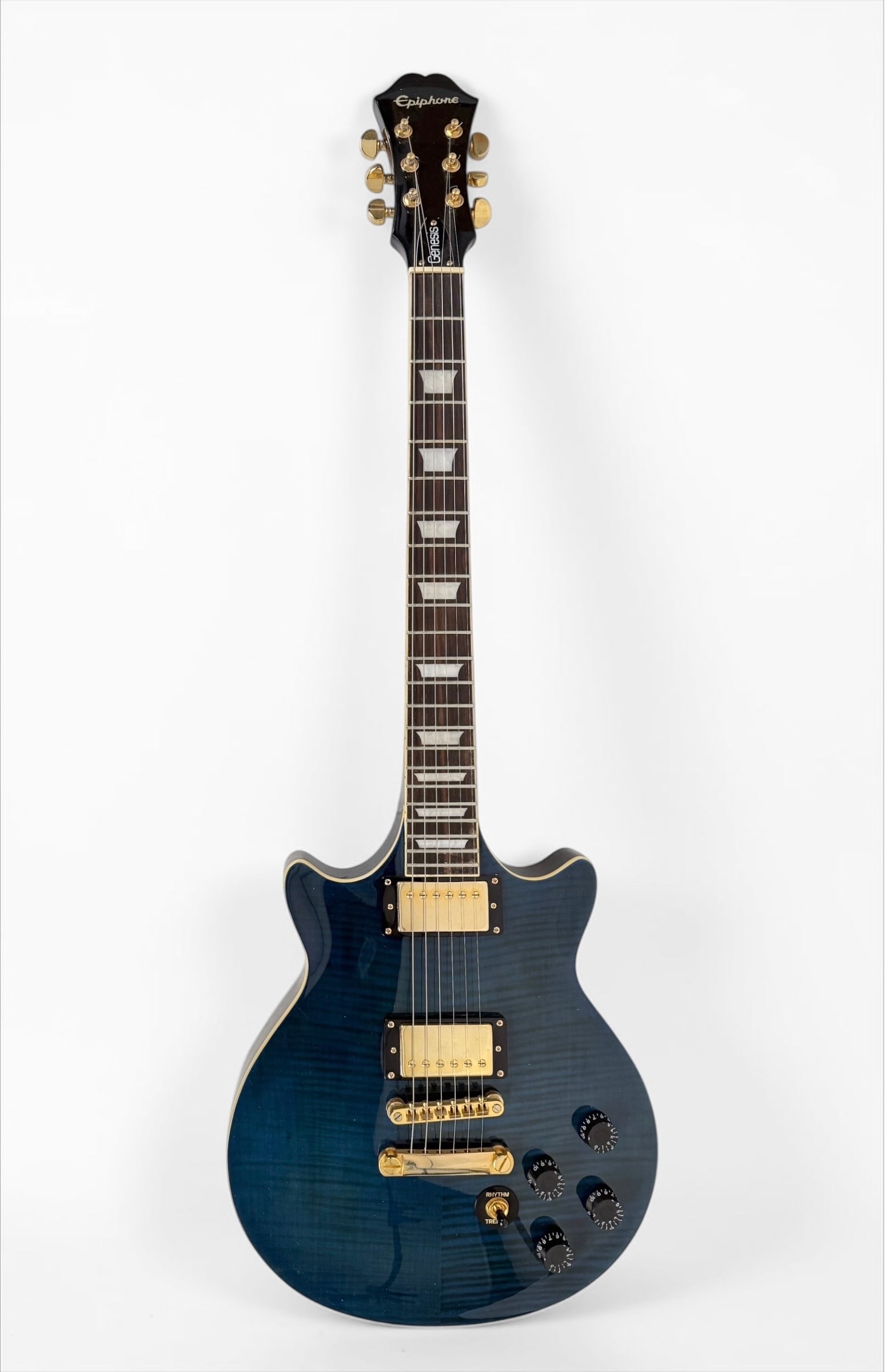 Epiphone Limited Edition Genesis Deluxe Pro Electric Guitar: Color: Midnight Sapphire Serial Number: 13051507089 Dimensions: 40" Long Condition: The guitar is in very good condition. 