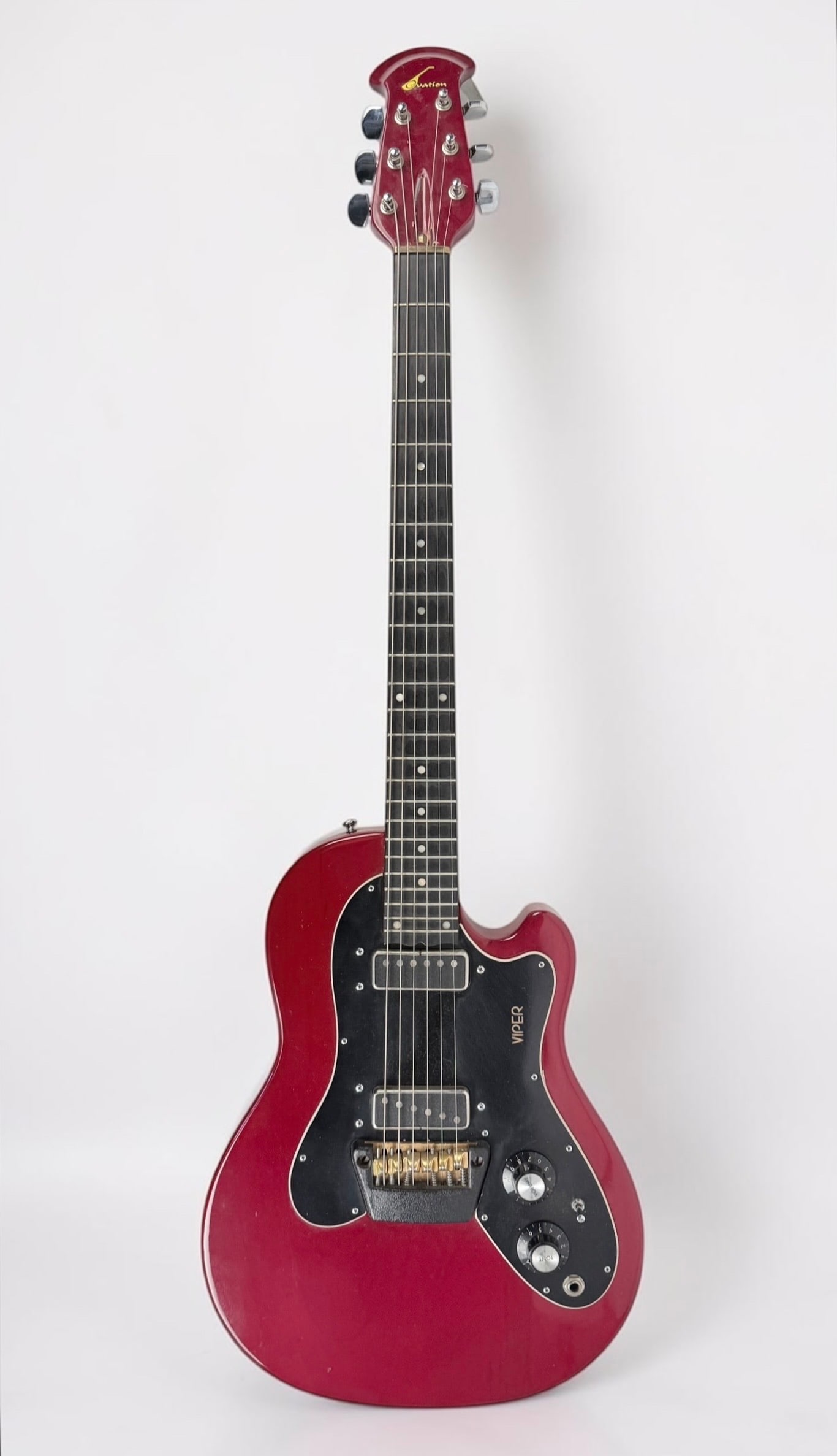 1975-1980 Ovation Viper Electric Guitar: Color: Red Serial Number: E 15481 Case: Hard Case Dimensions: Guitar: 40" Long Case: 42" Long Condition: The guitar is in good vintage condition. The case has ligh