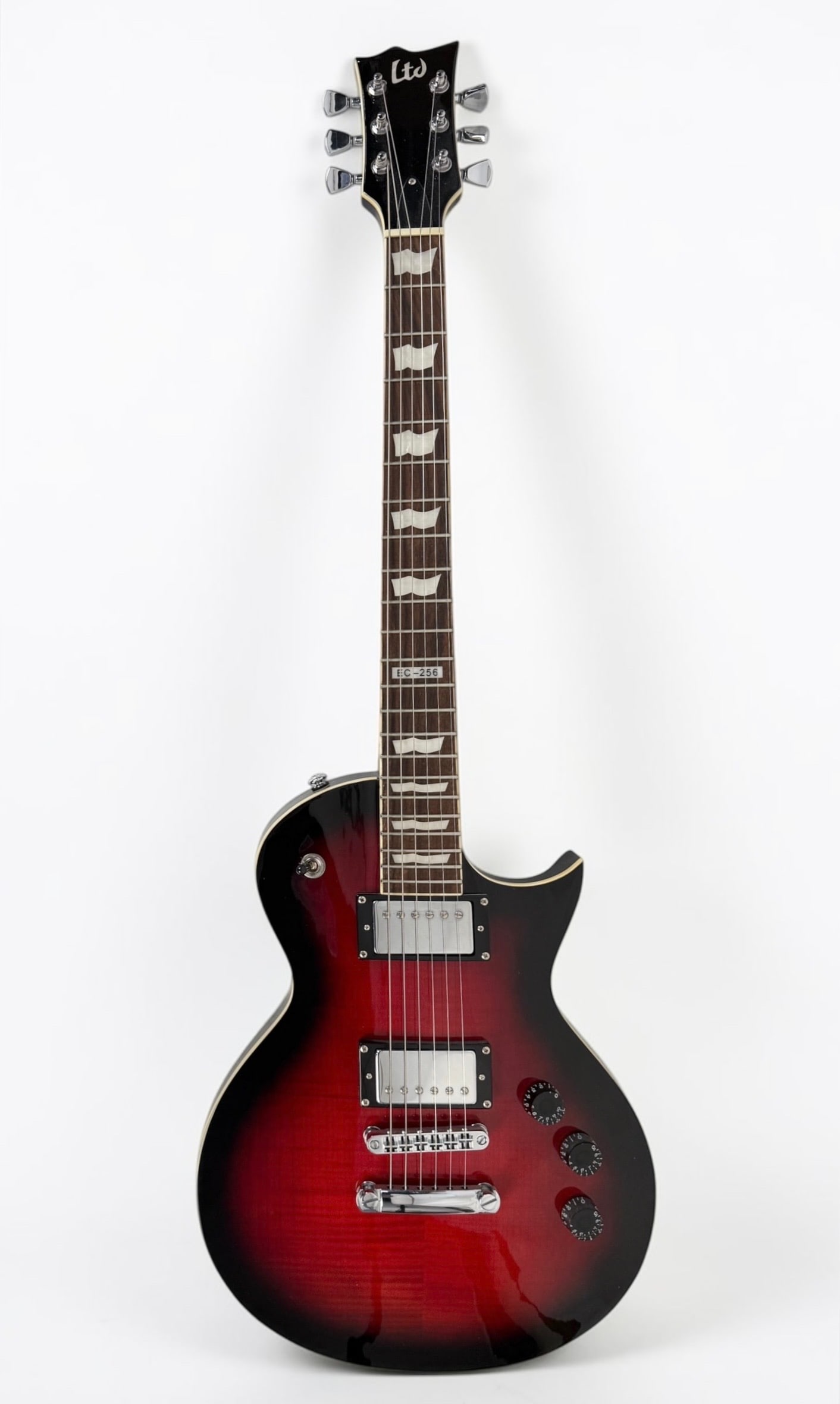 2013 ESP LTD EC-256 Electric Guitar: Color: See Thru Black Cherry Sunburst Serial Number: I13072074 Dimensions: 39" Long Condition: The guitar is in very good condition. 