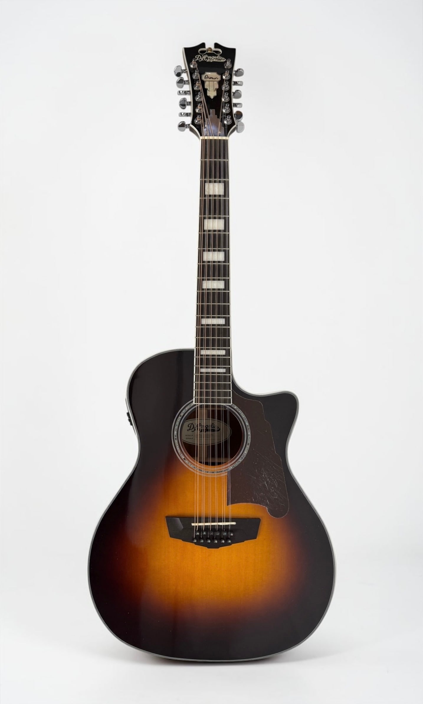 2010s D'Angelico Premier 12-String Acoustic Guitar: Color: Sunburst Serial Number: CC 180615405 Case: Hardcase Dimensions: 43" Long Condition: There are scratches to the pickguard and minor surface marks to the body. The case