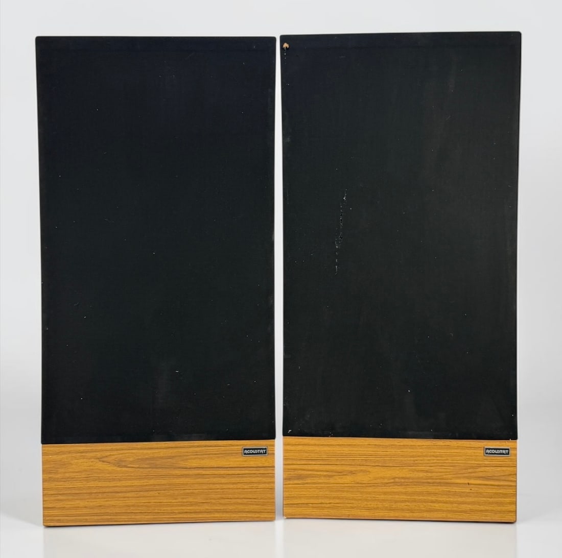 Pair of Vintage Acoustat Model 4 Full-Range Electrostatic Speakers: Dimensions: 59" x 27 3/4" x 11" Each Speaker Condition: Tears in the speaker fabric. General wear throughout, consistent with age and use. Not tested. 