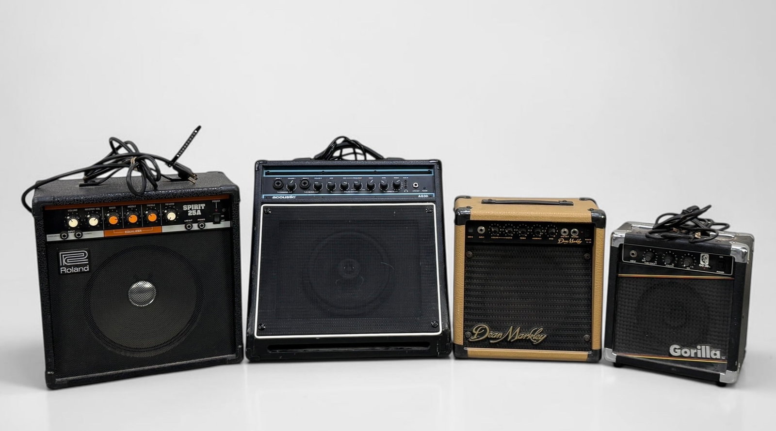 Group of Amplifiers (B): Roland, Acoustic, Dean Monkey, Gorilla. Dimensions: 16" x 17" x 15" Largest Speaker Condition: The items are verified as working by the consignor, not tested in-house. See