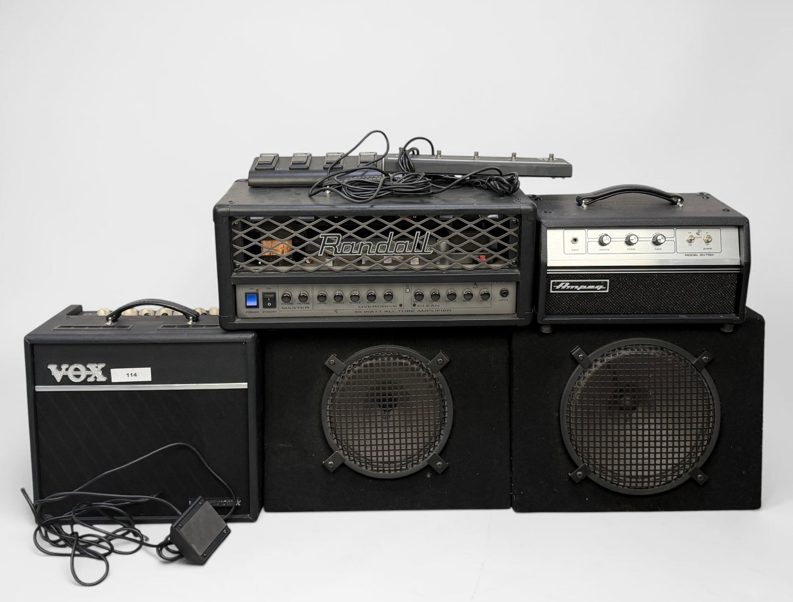 Group of Amplifiers (D): Lot includes some music equipment. Dimensions: 10" x 23 1/2" x 10" Largest Condition: Light wear throughout, but in overall good condition. Not tested. Se