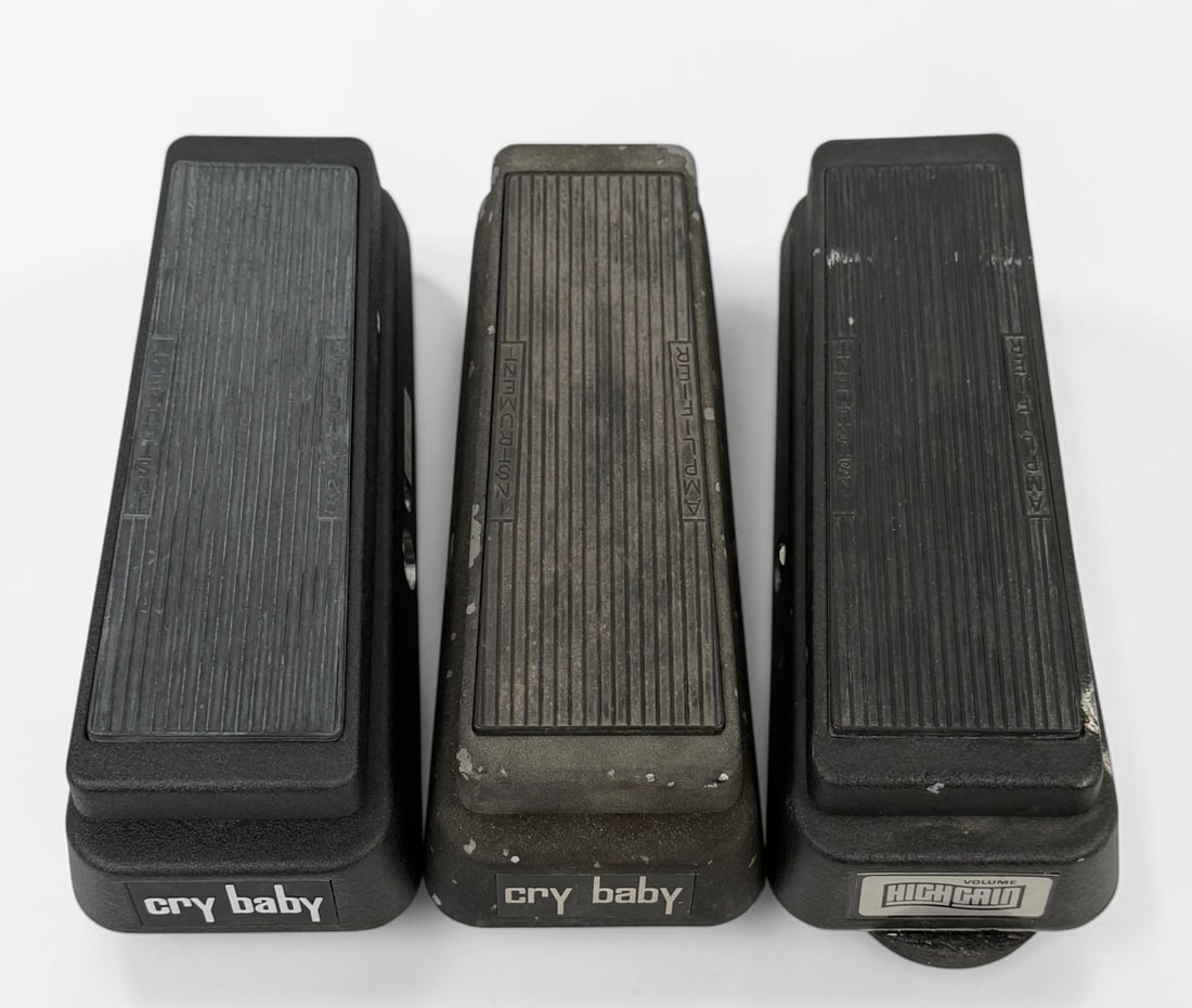 (3) Dunlop Guitar Pedals: Lot includes GCB95 Original Cry Baby, Cry Baby, and GCB-80 High Gain Dimensions: 3 1/2" x 5" x 10 1/2" Box Condition: Wear to the pedals from age and use. One pedal