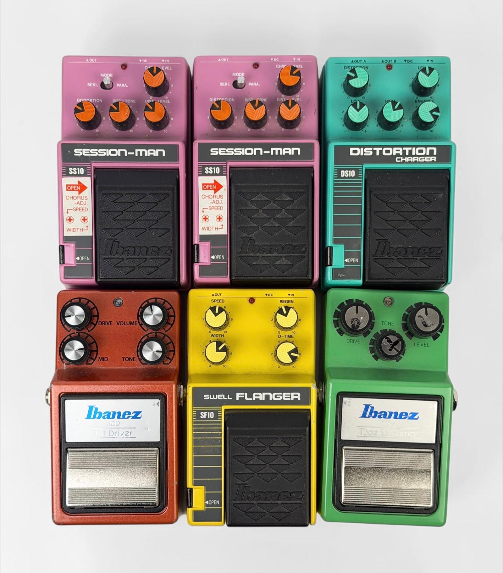 (6) Ibanez Vintage Guitar Pedals: Lot Includes (2) Session-Man SS10, Swell Flanger SF10, Jet Driver JD9, Tube Screamer TS 9, and Distortion Charger DS10 Dimensions: 2" x 3" x 5" per box Condition: