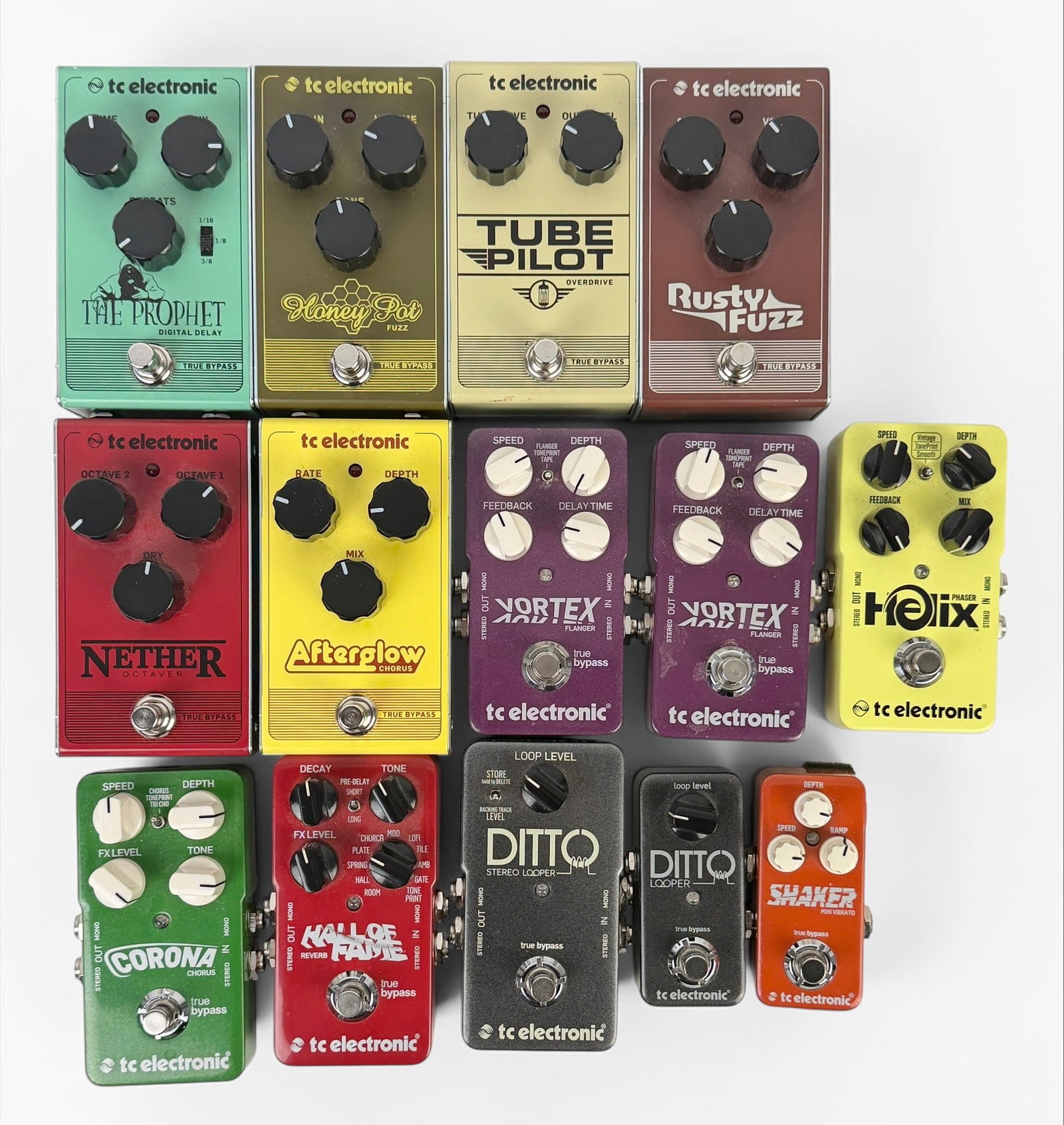 Group of TC Electronics Guitar Pedals: Lot includes Honey Pot Fuzz, Tube Pilot Overdrive, Hall of Fame Reverb, Corona Chorus, The Prophet Digital Delay, (2) Vortex Flanger, Ditto Looper, Shaker Mini Vibrato, Helix Phaser, Nether Octaver, A