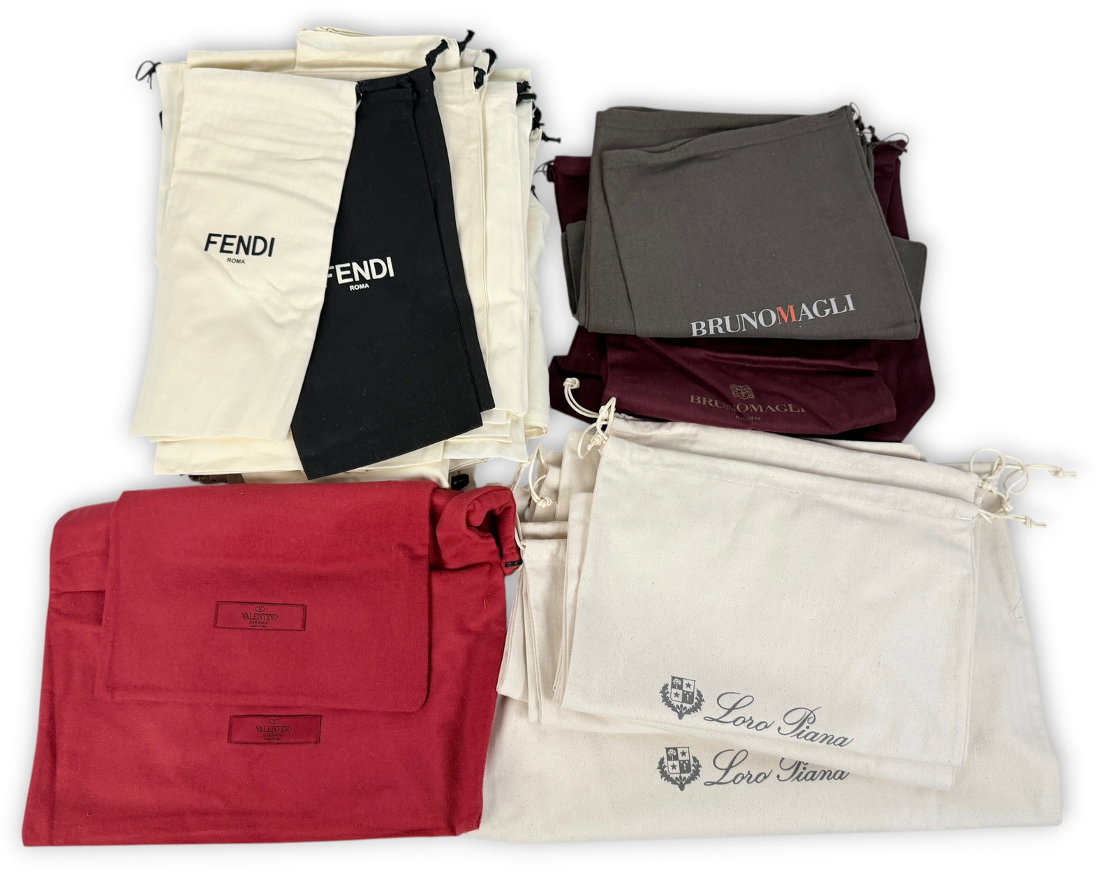 Large Group of Designer Dust Bags: Lot includes many bags from Christian Louboutin, Hermes, Bottega Veneta, and more. Condition: Please see images for details. 